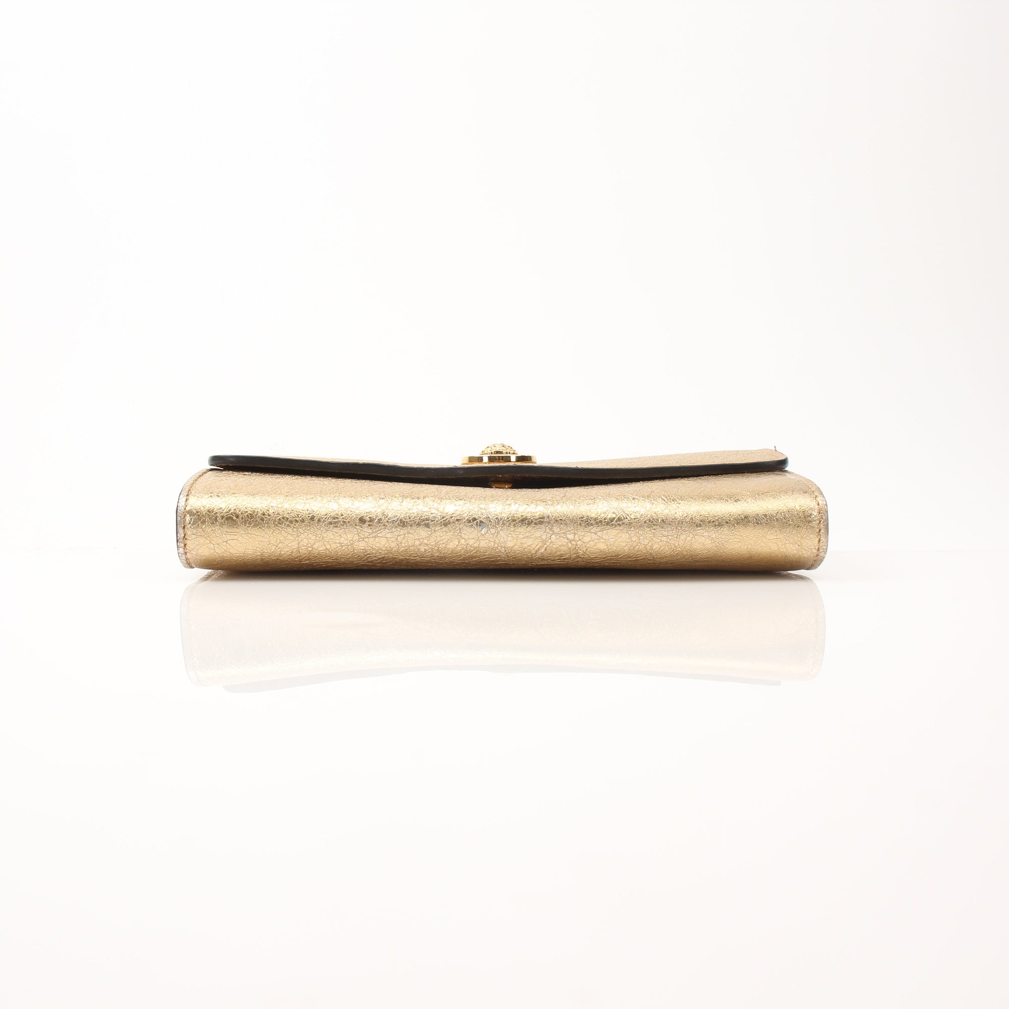 Gold & Beyond Versace Medusa flap chain wallet with gold-tone chain and signature Medusa logo on the front.