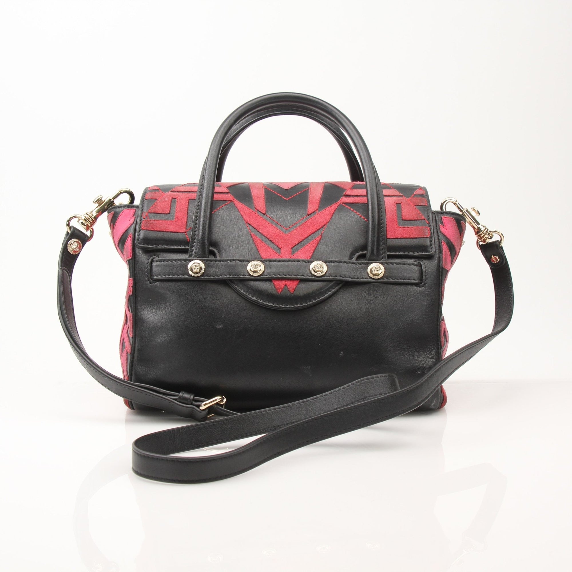Versace patchwork crossbody handbag with gold accents and adjustable strap, featuring a stylish and colorful design.