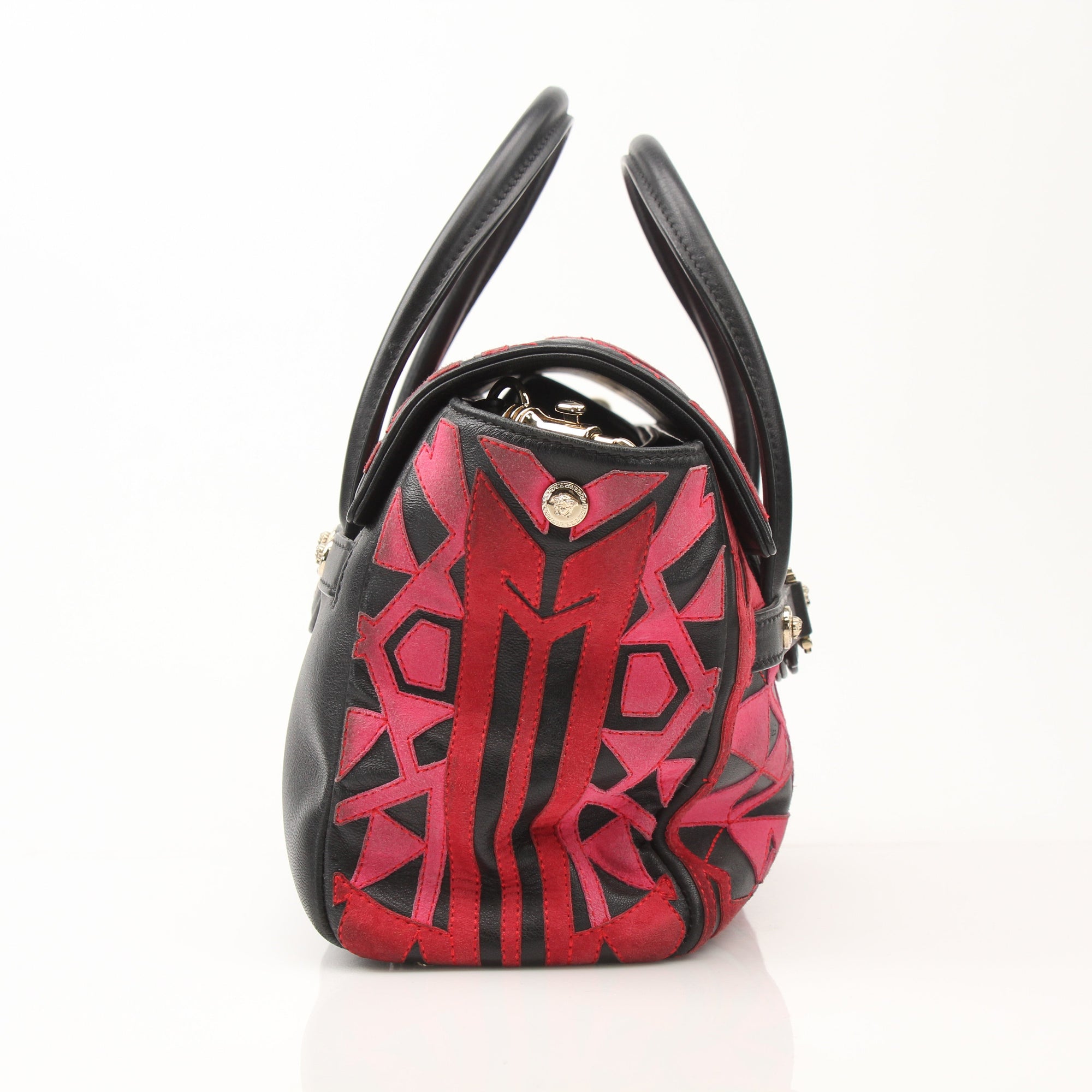 Versace Patchwork Crossbody handbag with gold accents, featuring colorful patchwork design and adjustable strap.