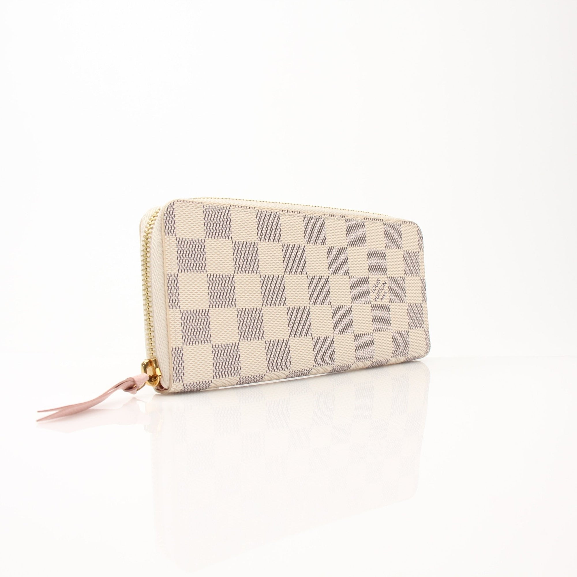 Louis Vuitton Clemence Wallet in classic monogram canvas, featuring a sleek design and multiple card slots.