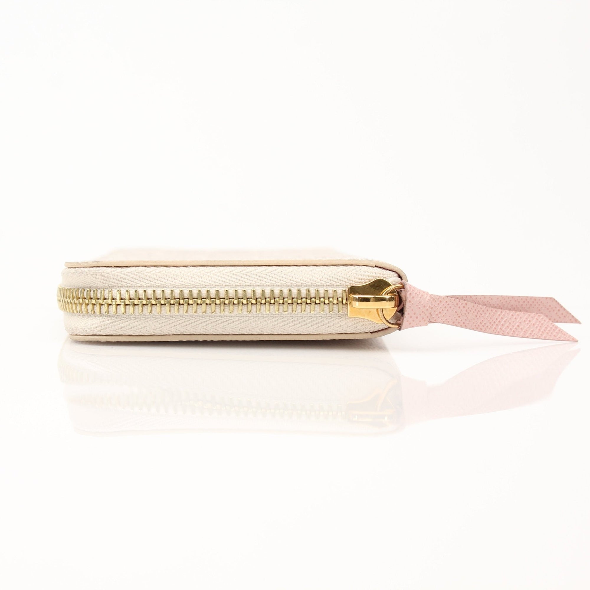 Louis Vuitton Clemence Wallet in soft leather, featuring a sleek design and multiple compartments for cards and cash.