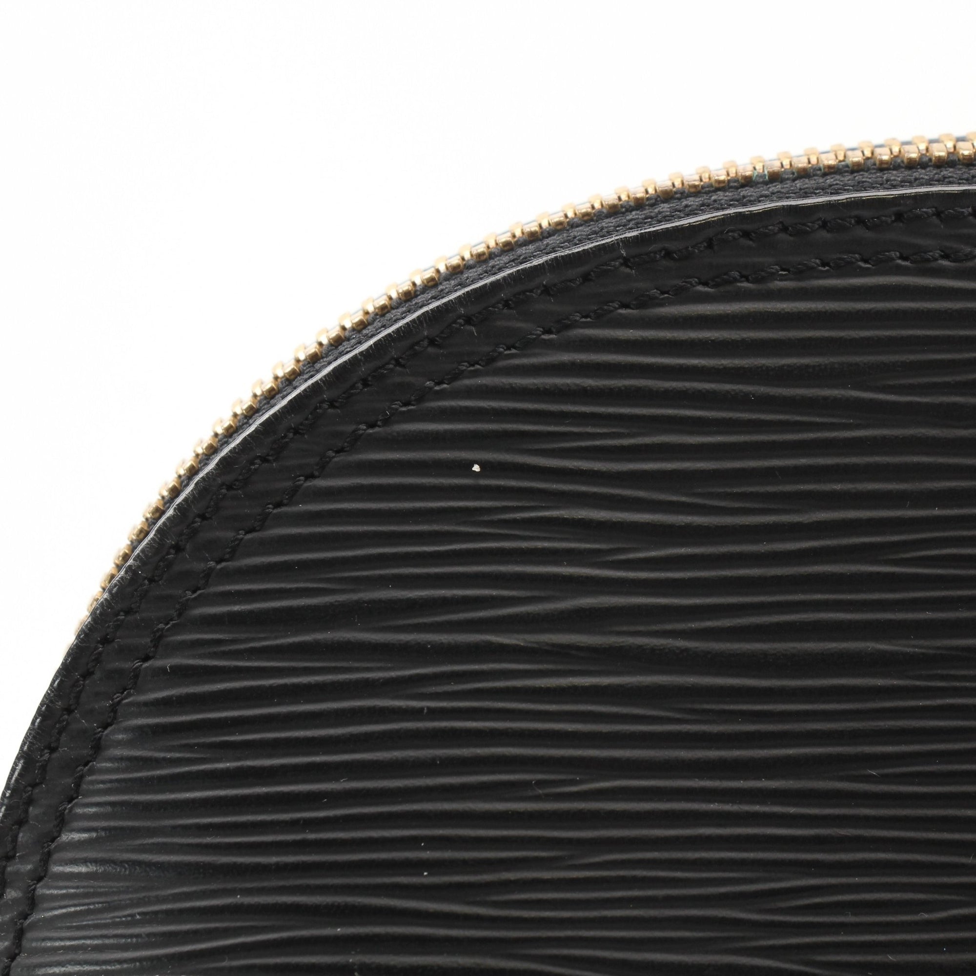 Louis Vuitton Epi Alma PM Handbag in classic black leather, featuring structured silhouette and dual top handles.