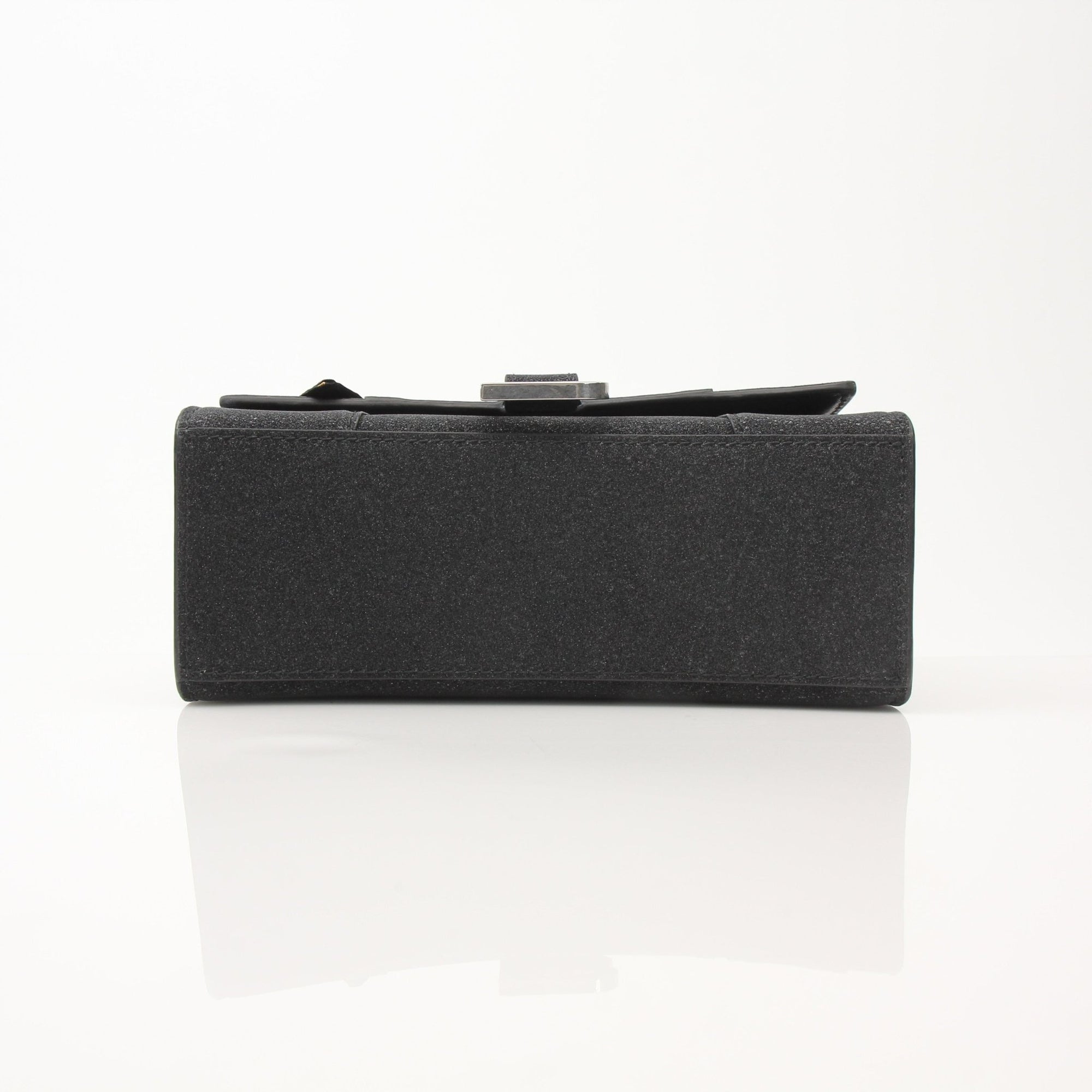 Gold & Beyond Balenciaga Hourglass XS handbag with gold hardware and sleek design, displayed on a neutral background.