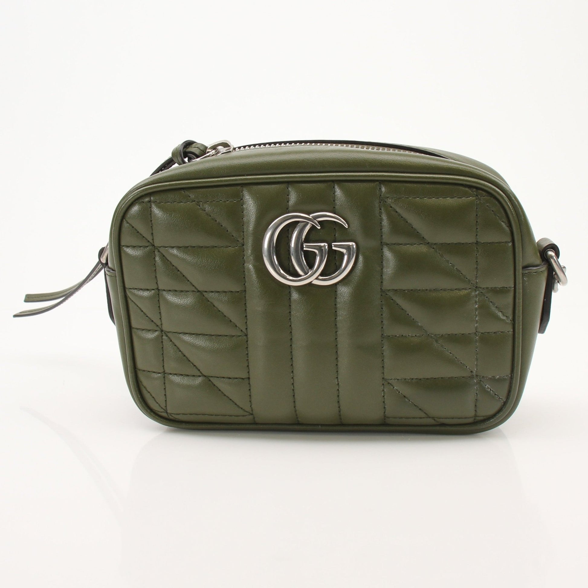 Gold & Beyond Gucci GG Camera Bag handbag with leather strap and signature monogram pattern, stylish and compact for everyday use.