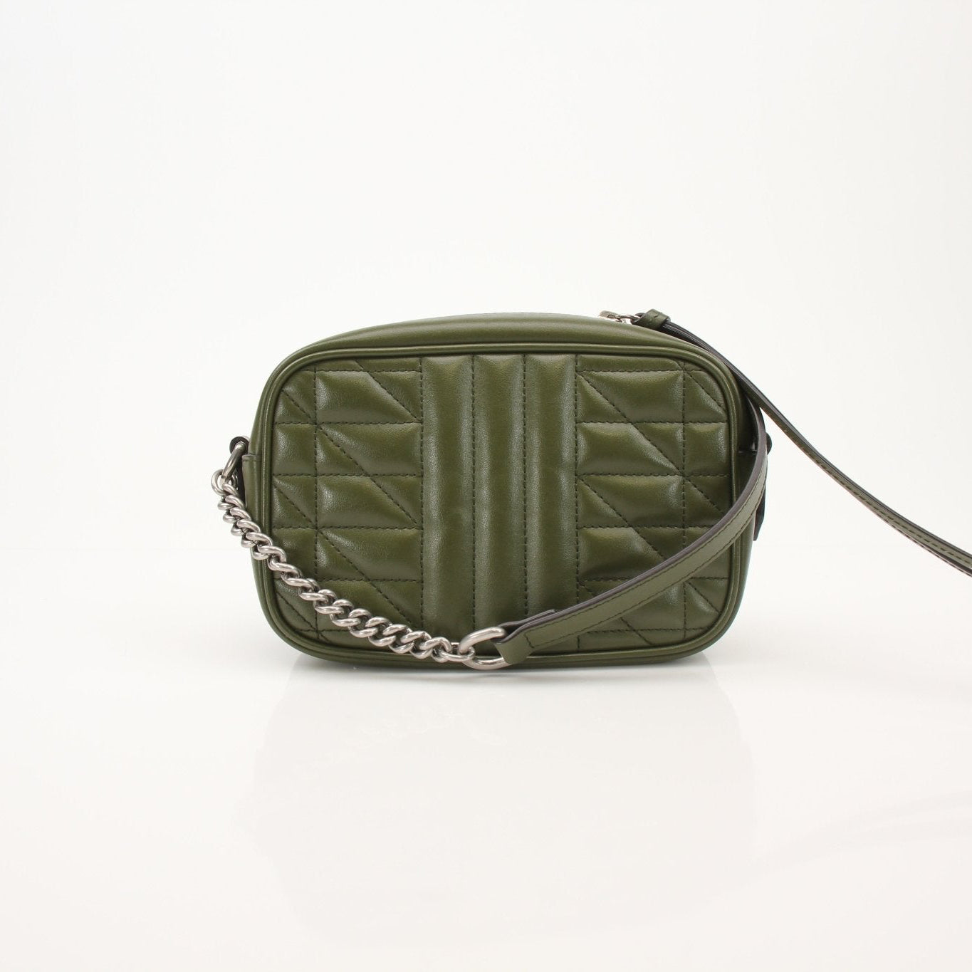 Gold & Beyond Gucci GG Camera Bag handbag with gold accents and adjustable strap, featuring signature GG monogram print.
