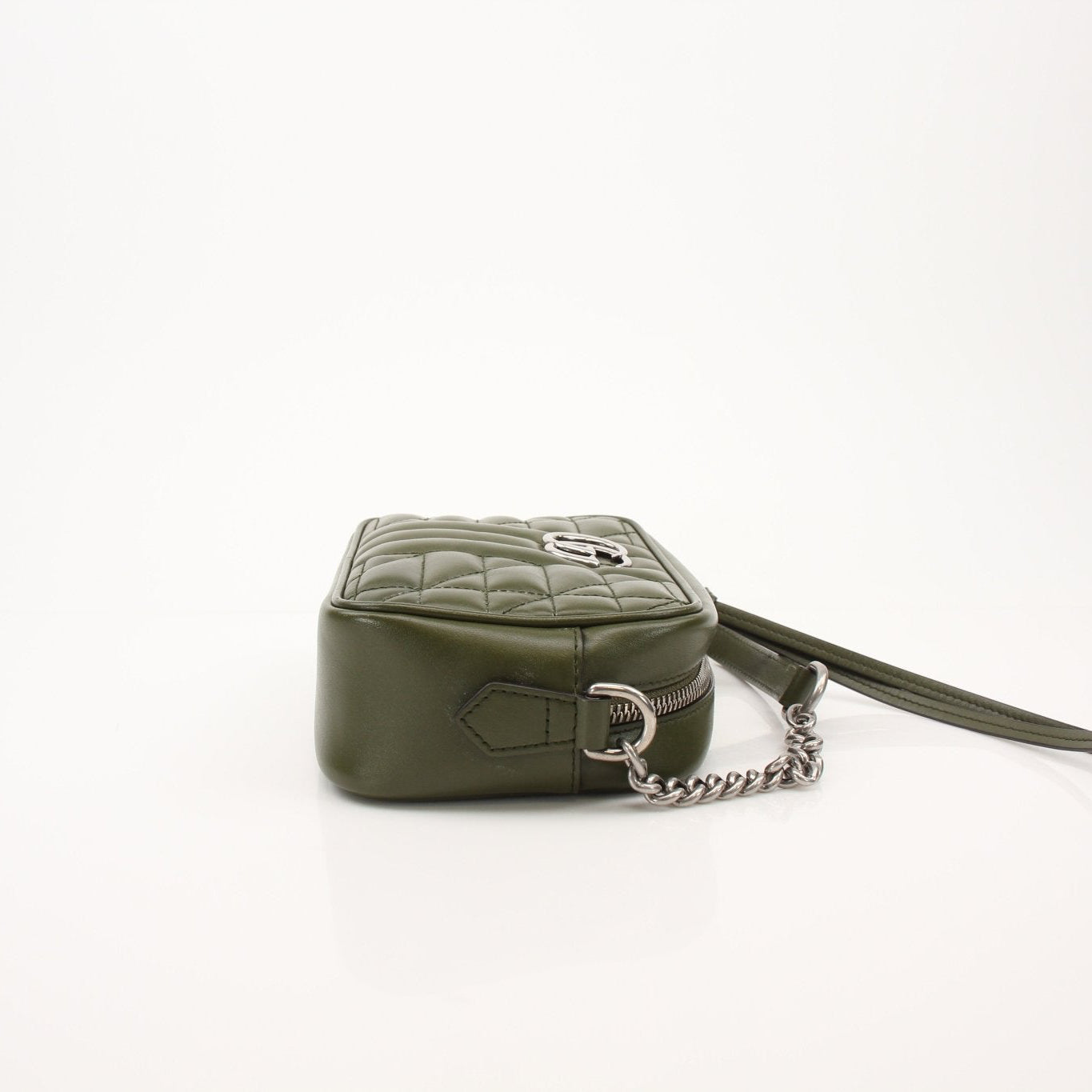 Gold & Beyond Gucci GG Camera Bag handbag with signature logo and adjustable strap, stylish accessory for everyday use.