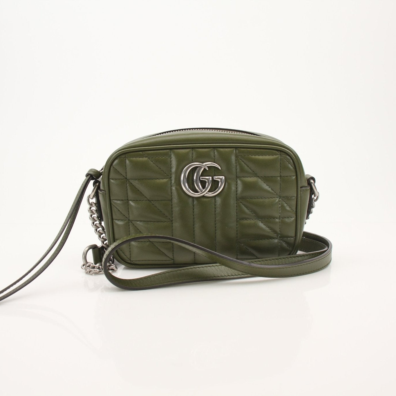 Gucci GG Camera Bag handbag with gold hardware and adjustable strap, stylish accessory for everyday use.