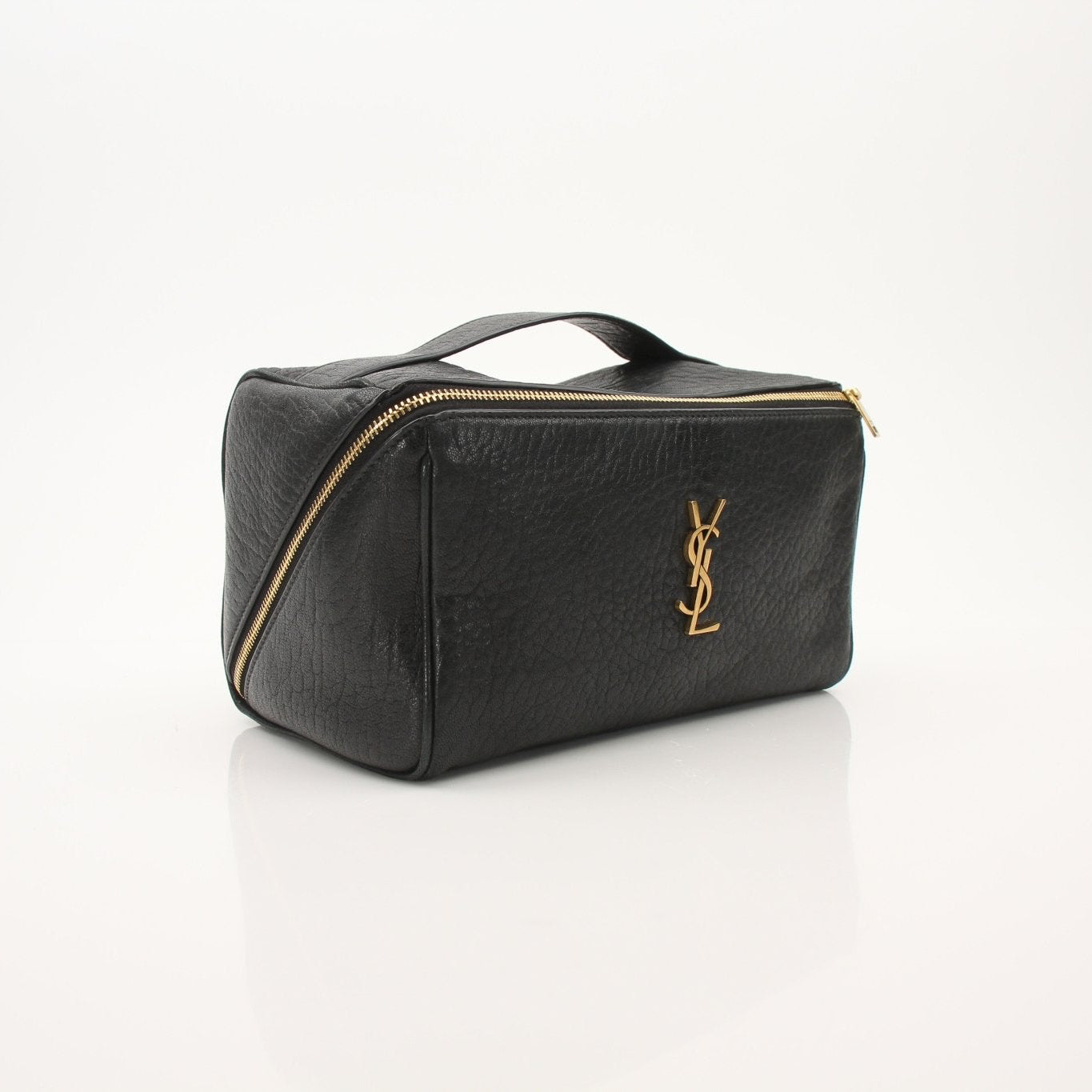 Gold & Beyond Saint Laurent vanity case with sleek design and compact storage, featuring a luxurious exterior and structured shape.