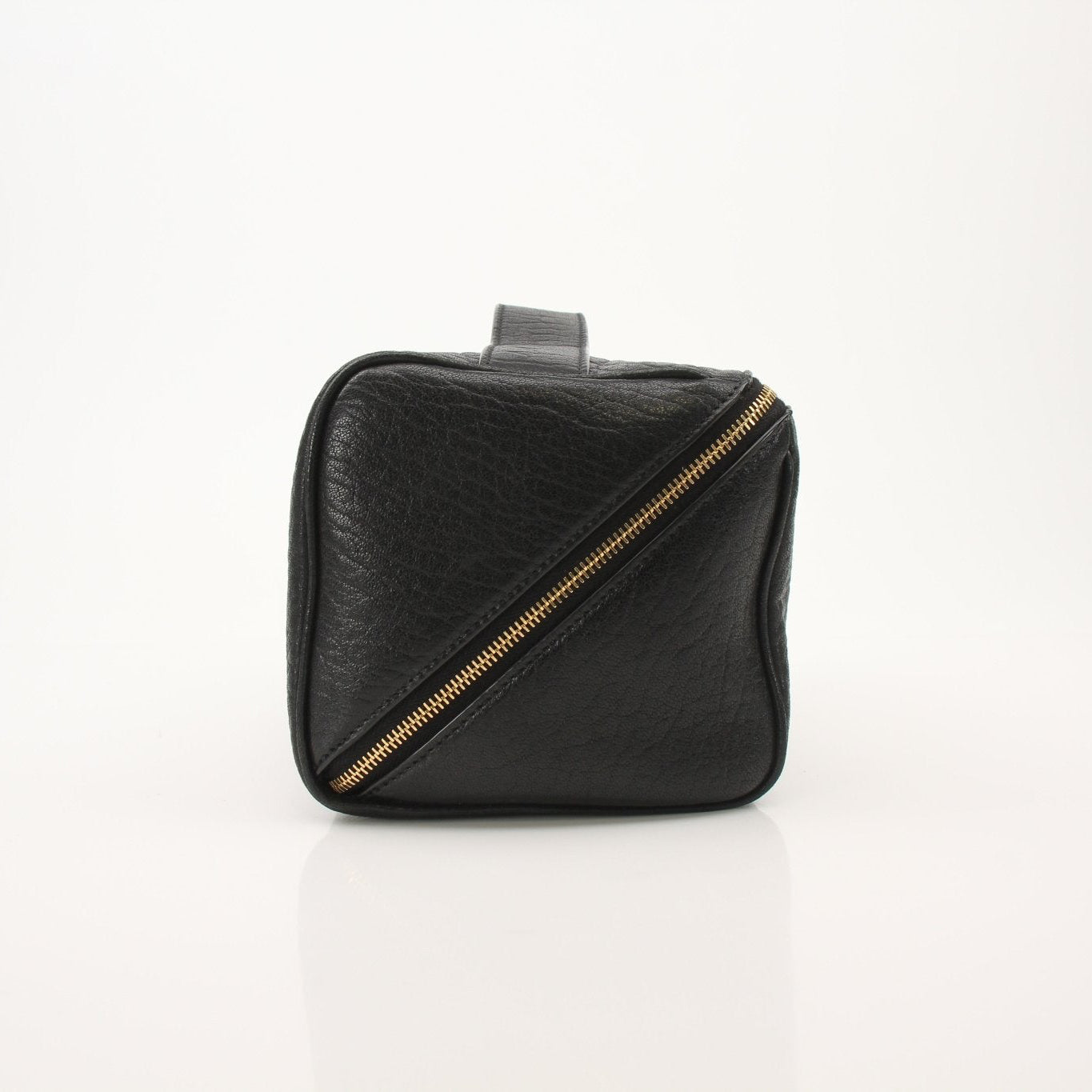 Gold & Beyond Saint Laurent vanity case with sleek design, shown open with interior compartments and elegant exterior details.