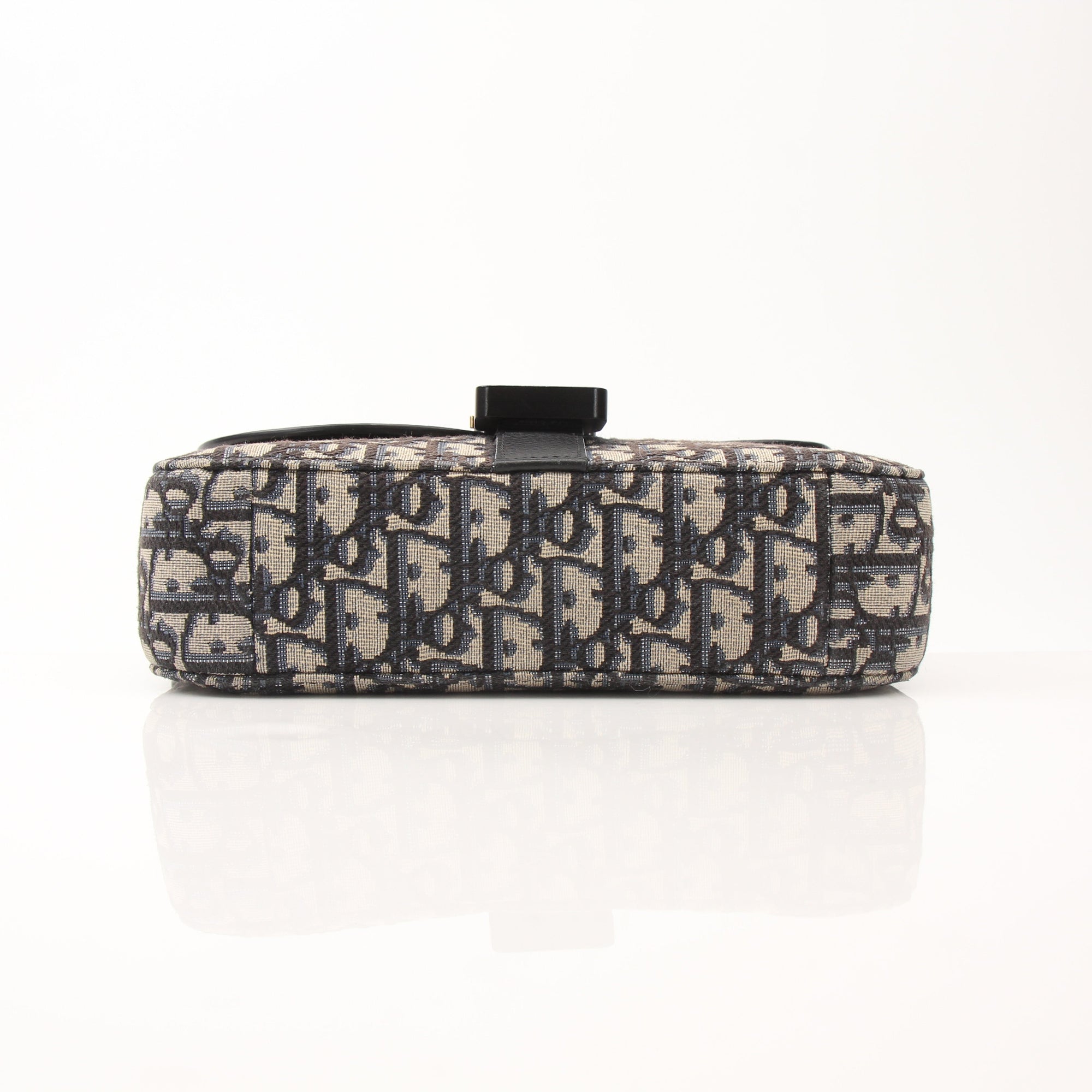 Gold & Beyond Dior Saddle Messenger handbag with adjustable strap, tan leather, and signature saddle design.