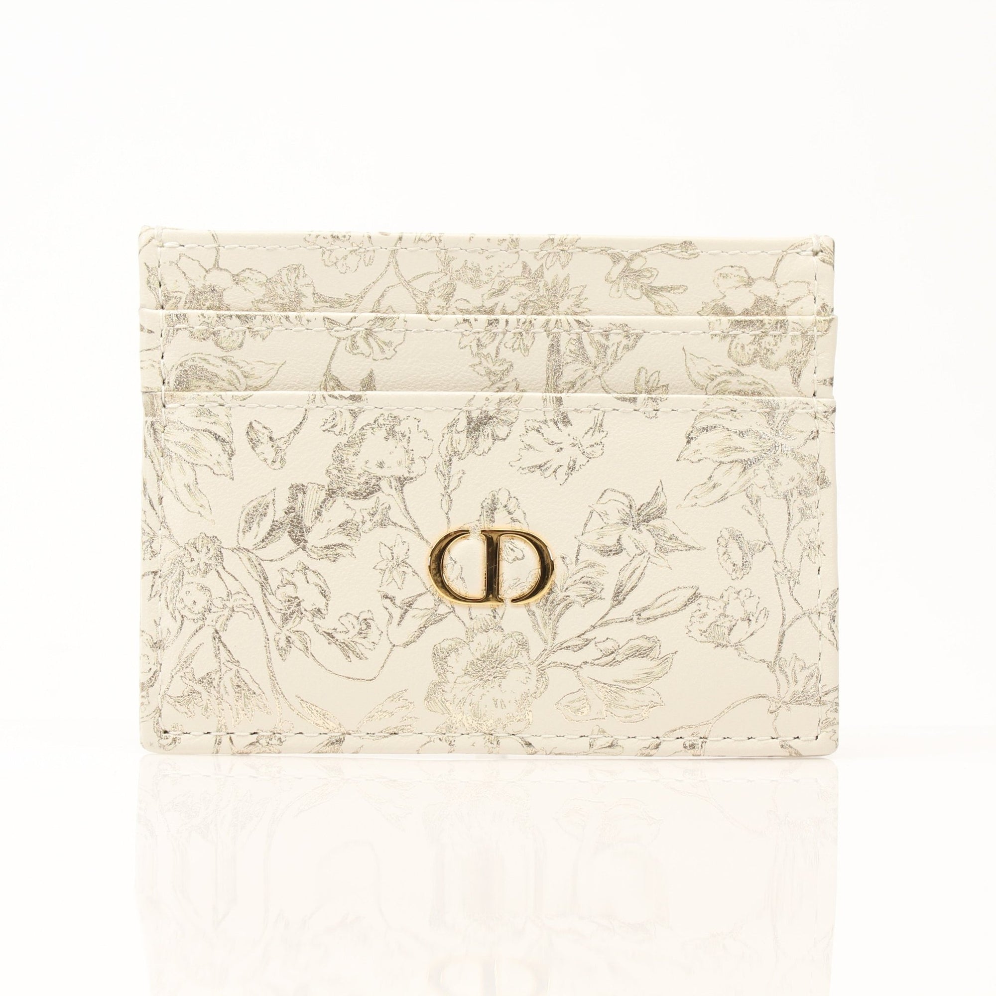 Christian Dior Caro Freesia leather cardholder wallet with gold accents, featuring multiple card slots and a sleek design.