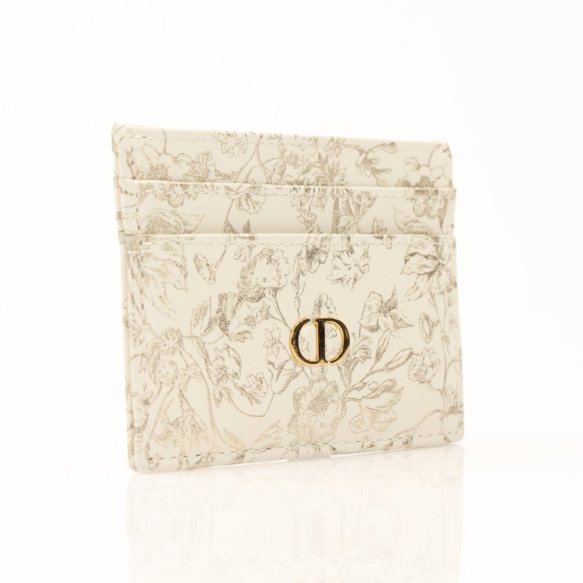 Christian Dior Caro Freesia leather cardholder wallet with multiple card slots, featuring a sleek design and gold-tone accents.