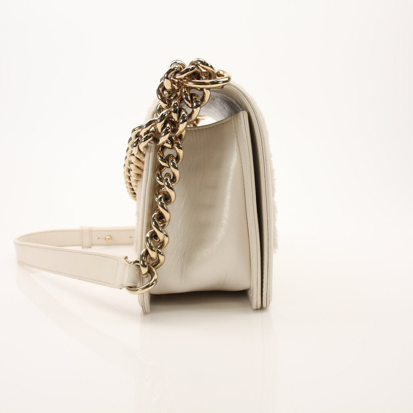 Gold & Beyond Chanel Le Boy shoulder handbag, black quilted leather with gold chain strap and signature CC logo detail.