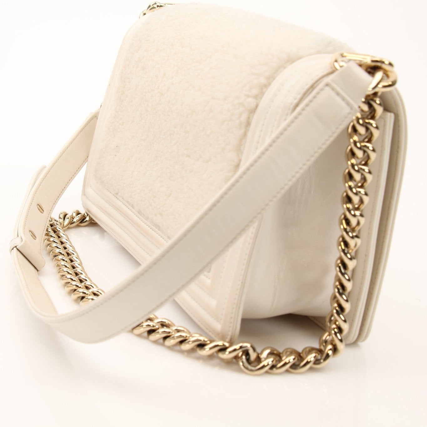 Gold & Beyond Chanel Le Boy Shoulder Bag, stylish handbag with gold-tone hardware and black leather, showing front view and chain strap.
