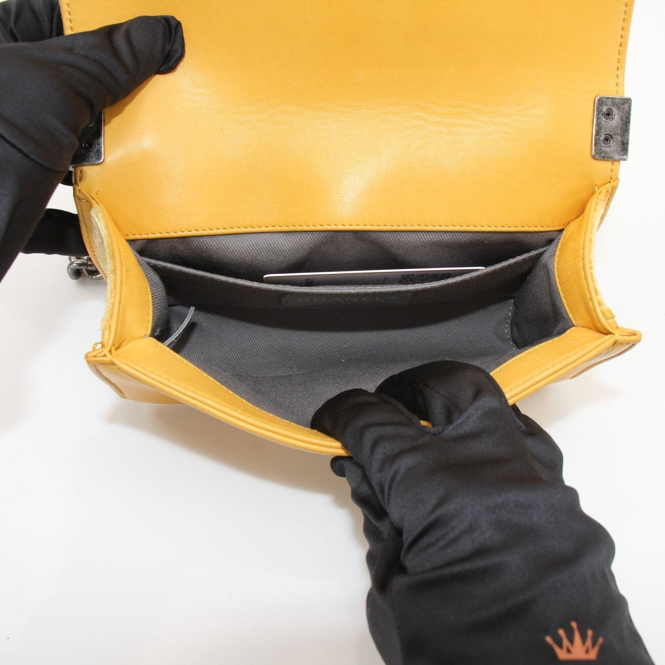 Chanel Small Le Boy Bag in mustard yellow velvet and leather, featuring gold hardware and a chain strap.