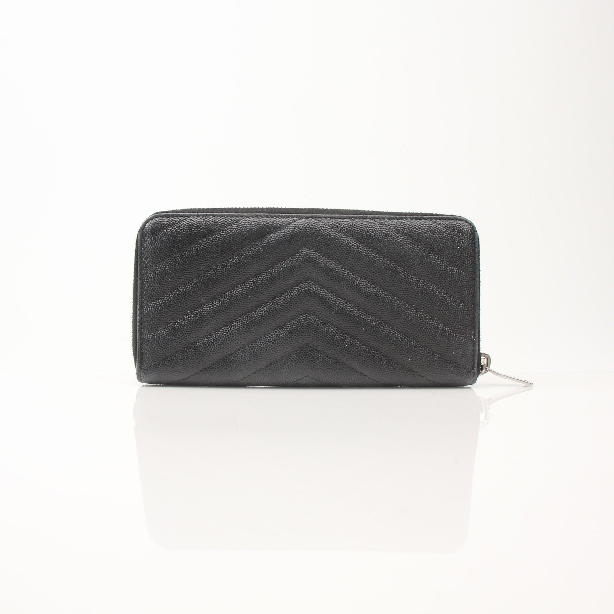 Yves Saint Laurent Chevron Wallet in black leather with chevron pattern and gold accents, showcasing elegant design features.