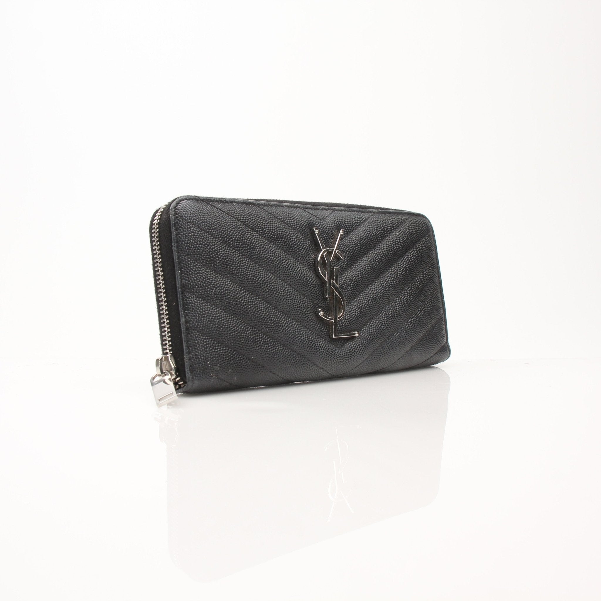 Gold & Beyond Yves Saint Laurent Chevron Wallet showing textured black leather with gold accents and multiple card slots.