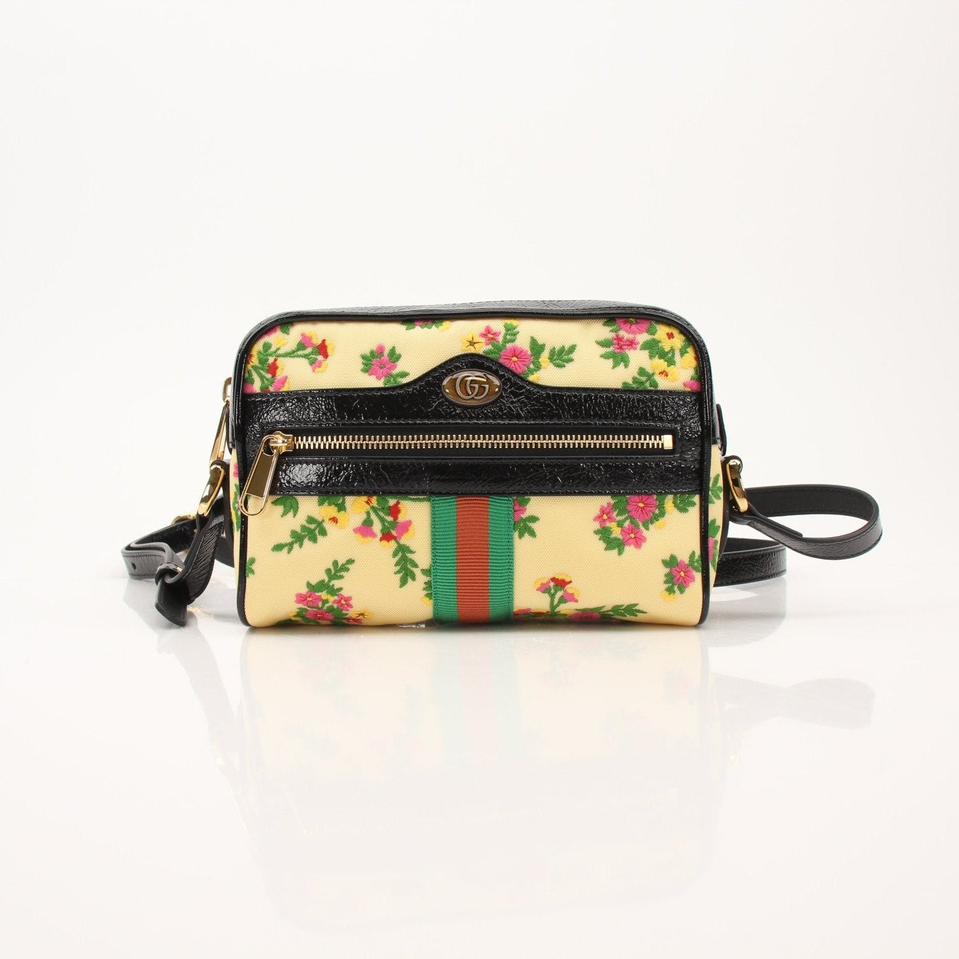 Gucci Ophidia floral crossbody handbag with signature design and colorful floral pattern, featuring a compact and stylish shape.
