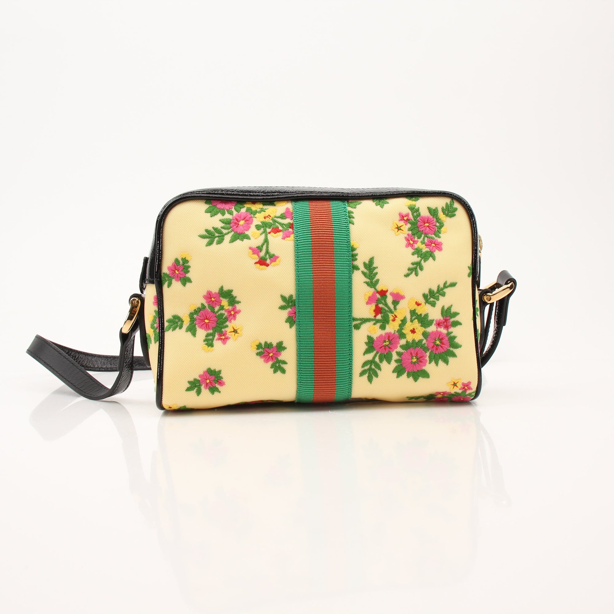 Gucci Ophidia floral crossbody handbag with signature design, gold accents, and adjustable strap, stylish accessory for daily wear.