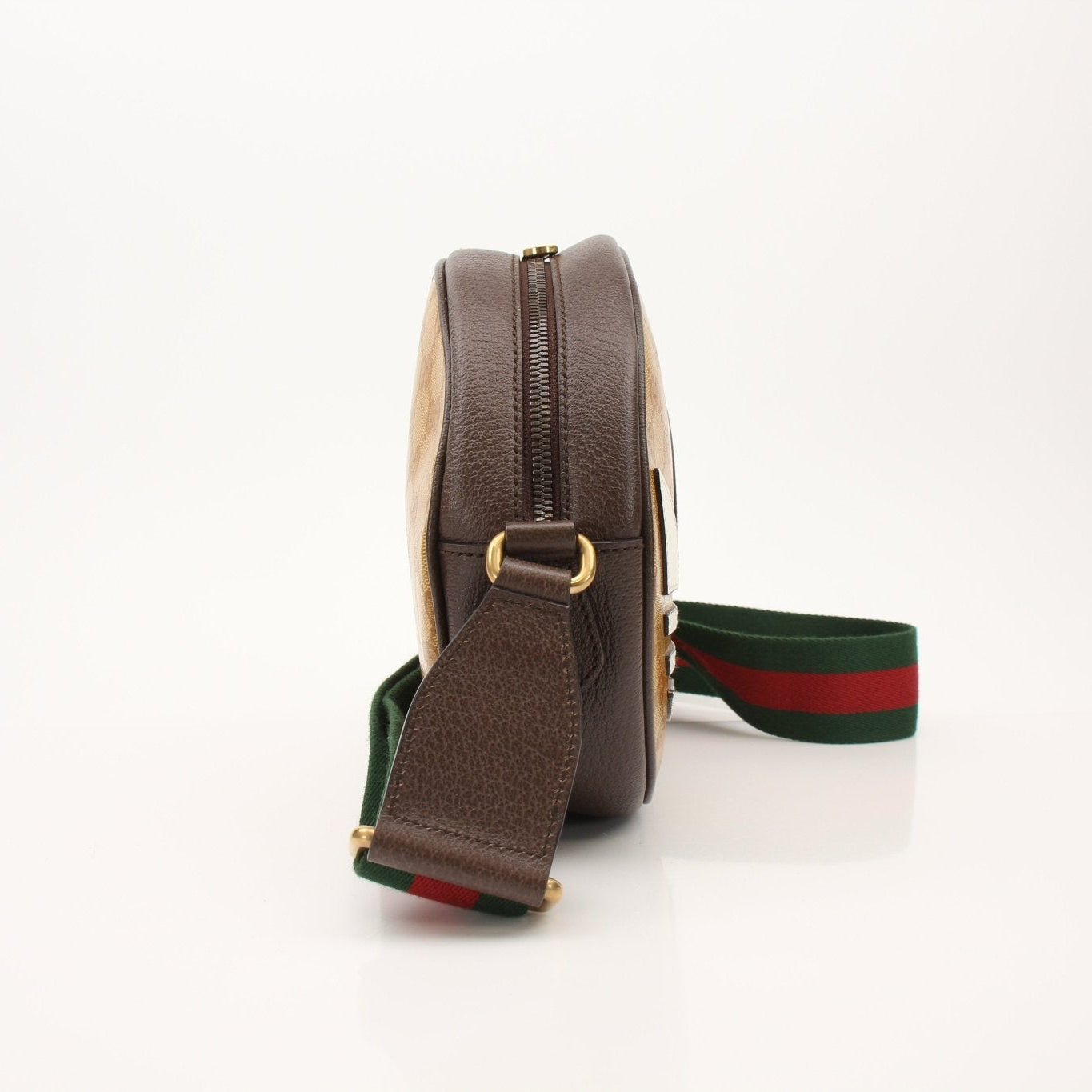 Gucci x Adidas round shoulder handbag featuring a sleek design and gold accents, perfect for stylish casual wear.