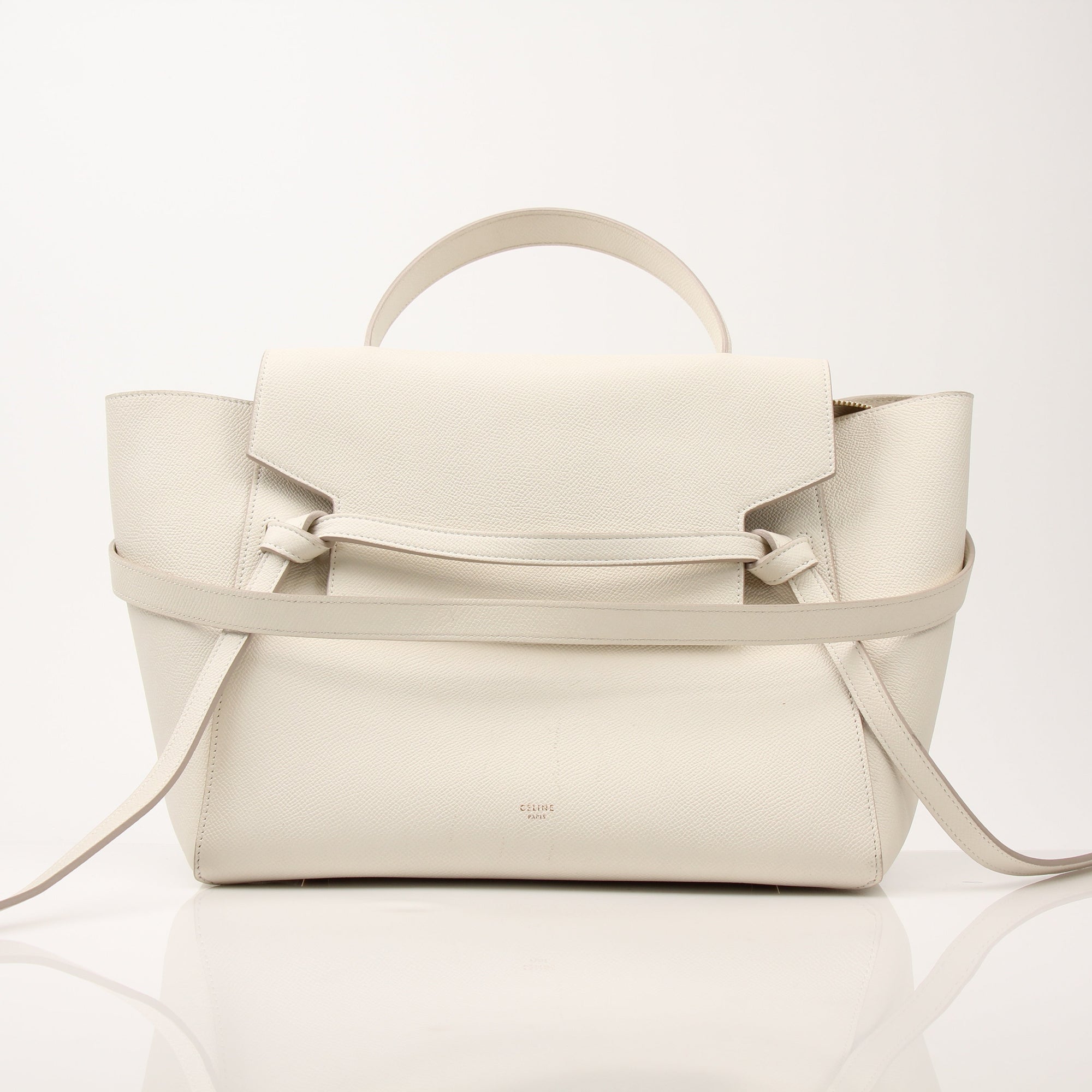 Gold & Beyond Celine Mini Belt Bag handbag with sleek design and adjustable strap, displayed on a neutral background.