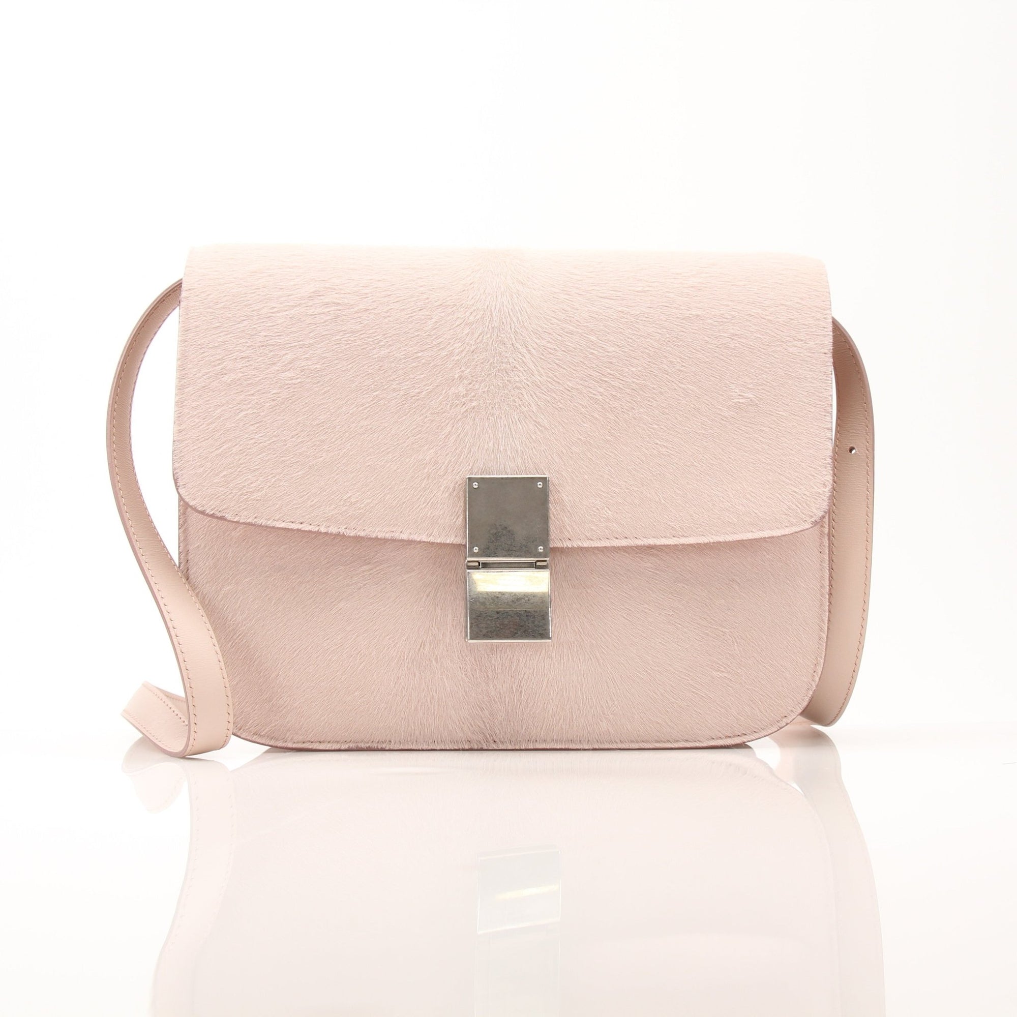 Gold & Beyond Celine Clasp Classic Shoulder Bag handbag with gold hardware and structured design, shown in a close-up image.