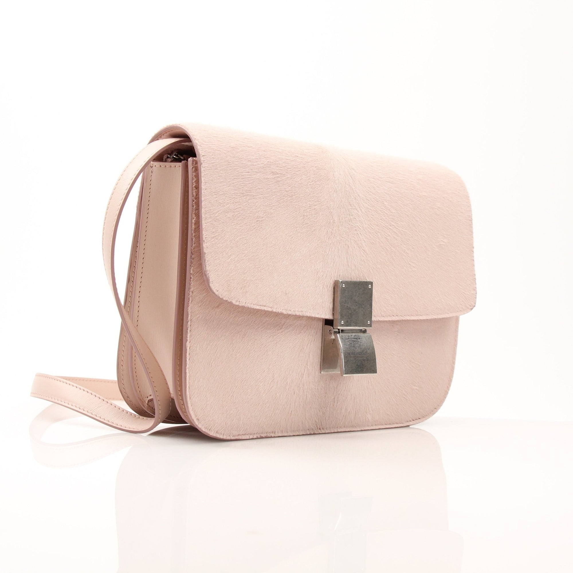 Gold & Beyond Celine Clasp Classic Shoulder Bag handbag with gold clasp and structured design, displayed on a neutral background.