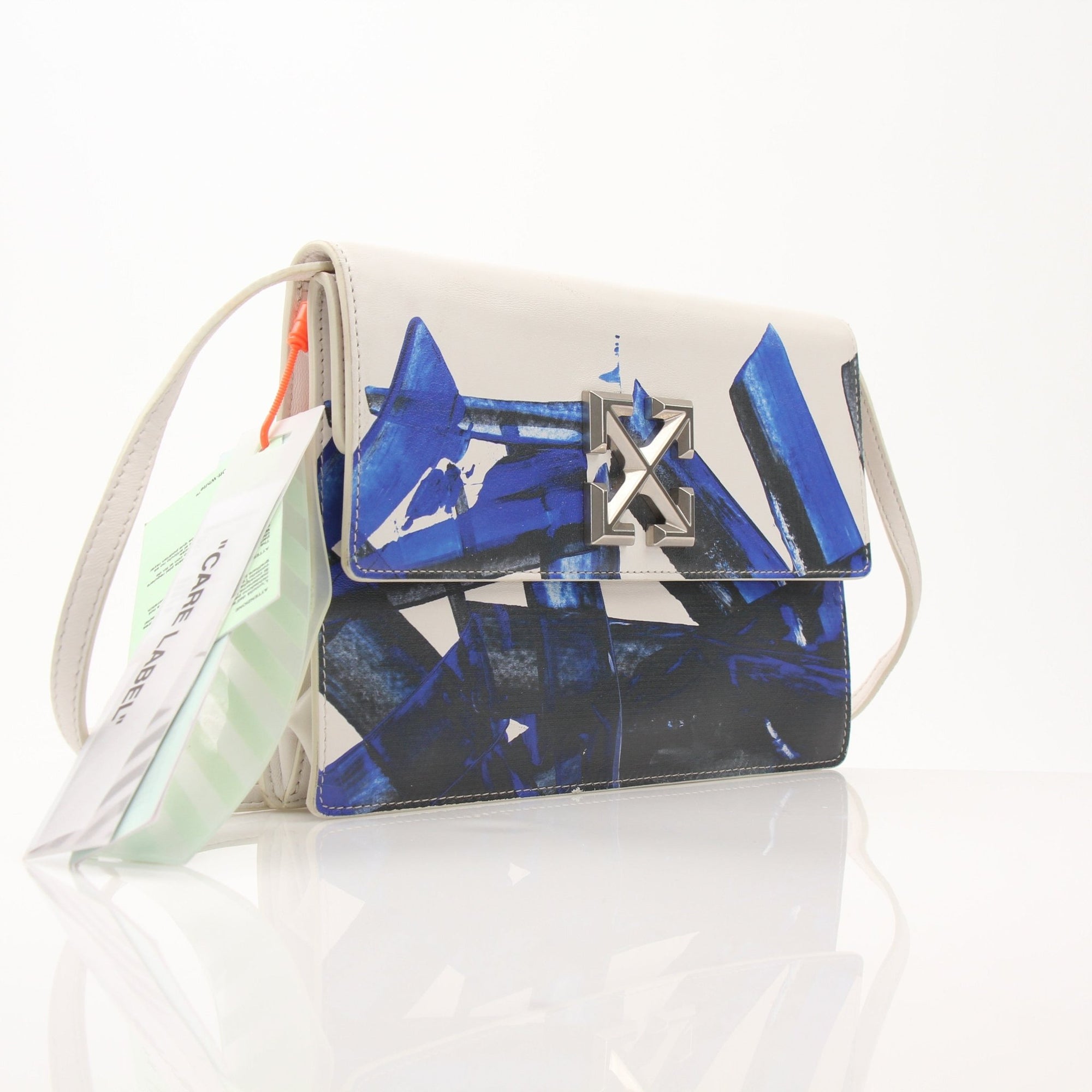 Gold & Beyond Off-White Jitney 1.0 shoulder handbag with sleek design and top handle, shown in a detailed front view.