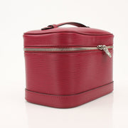 Gold & Beyond Louis Vuitton Nice Vanity Case with structured leather exterior and gold hardware for stylish storage.