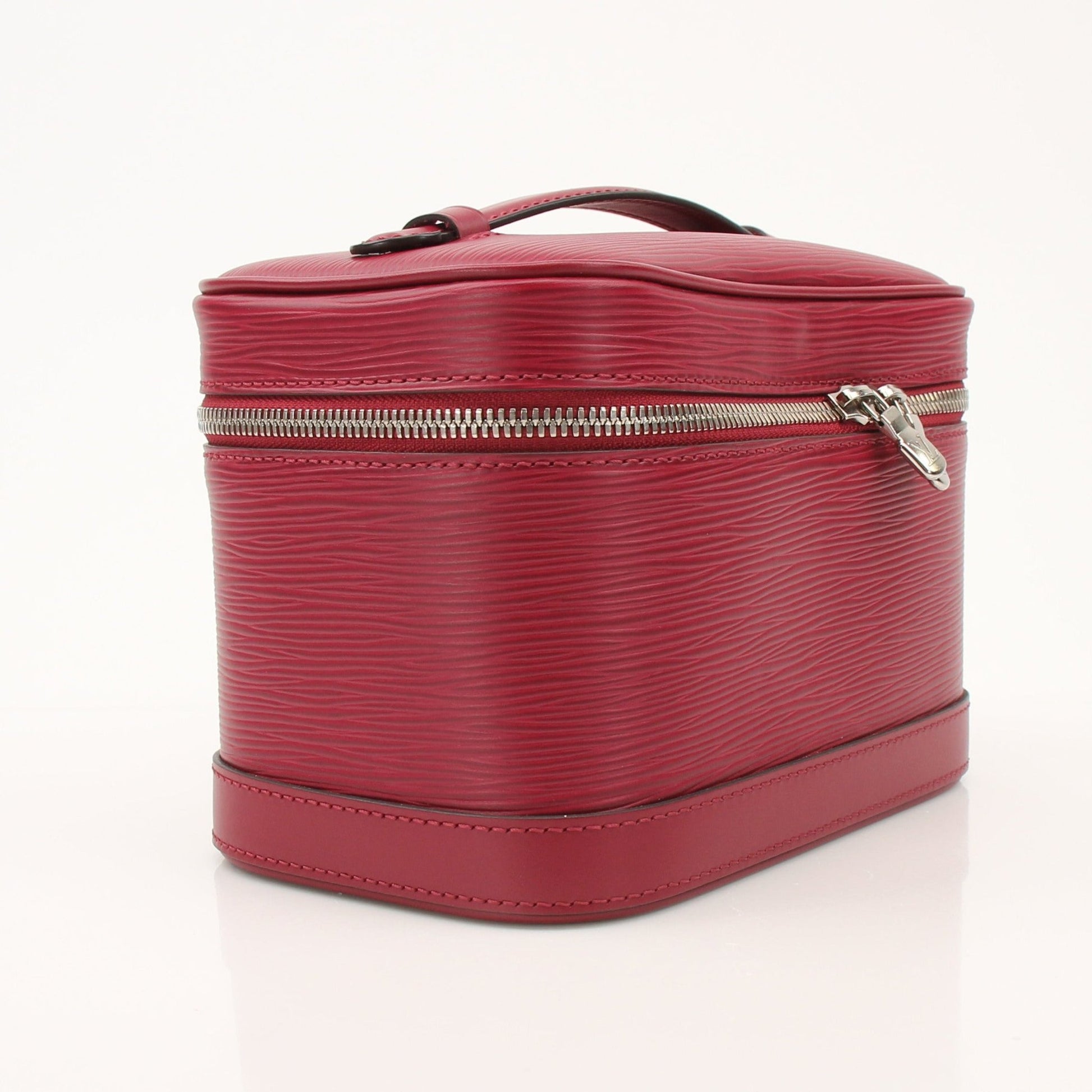 Gold & Beyond Louis Vuitton Nice Vanity Case with structured leather exterior and gold hardware for stylish storage.