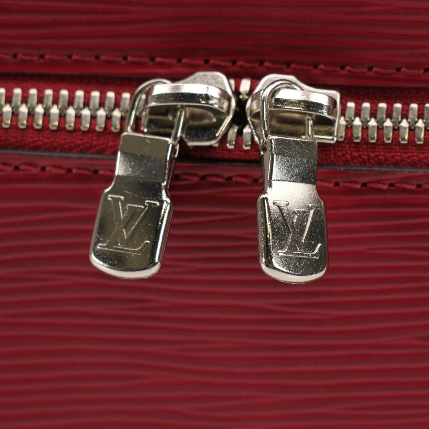 Gold & Beyond Louis Vuitton Nice Vanity Case, stylish travel accessory with structured design and logo details.