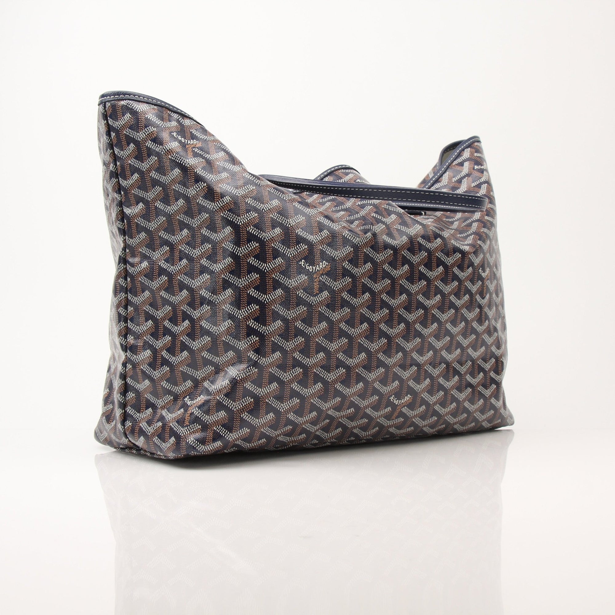 Goyard Saint Louis PM tote handbag with beige canvas and leather handles, featuring the classic Goyard pattern.