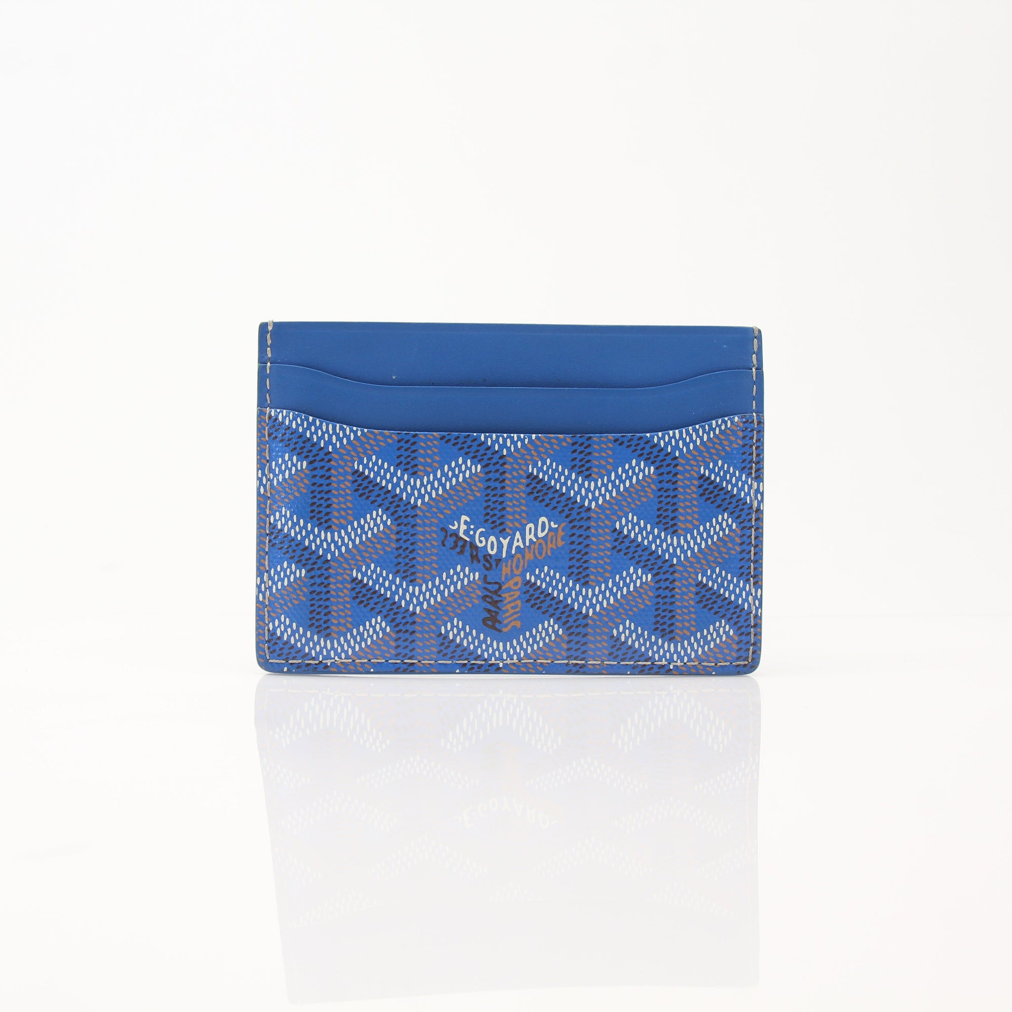 Gold & Beyond Goyard Saint Sulpice card holder with multiple card slots and Goyard signature pattern on smooth leather.