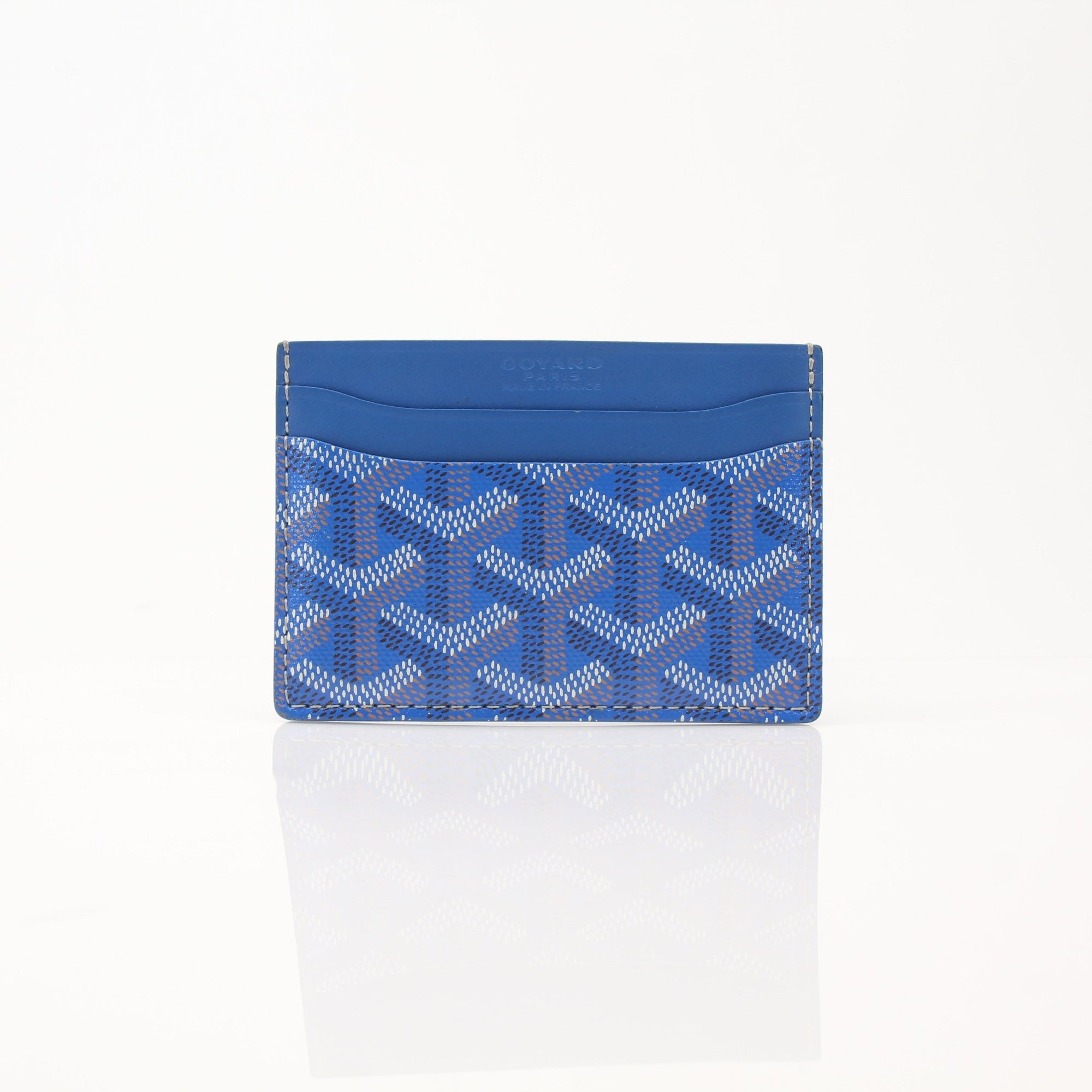 Gold & Beyond Goyard Saint Sulpice card holder with multiple card slots and signature Goyard pattern in close-up view.