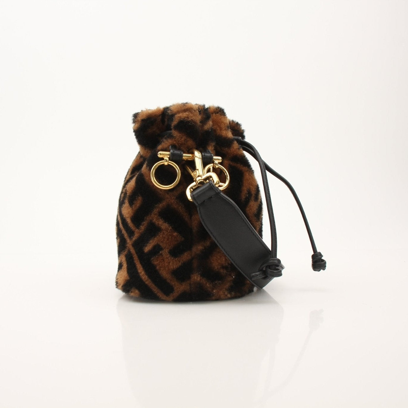 Gold & Beyond Fendi Macro Bucket Bag handbag with textured design, top handle, and stylish silhouette.