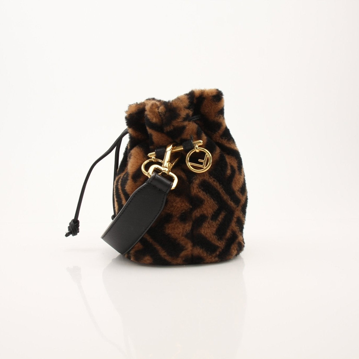 Gold & Beyond Fendi Macro Bucket Handbag with leather strap and signature logo detail on a neutral background.