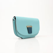 Gold & Beyond Hermès Convoyeur handbag with sleek leather design and gold hardware, displayed on a neutral background.