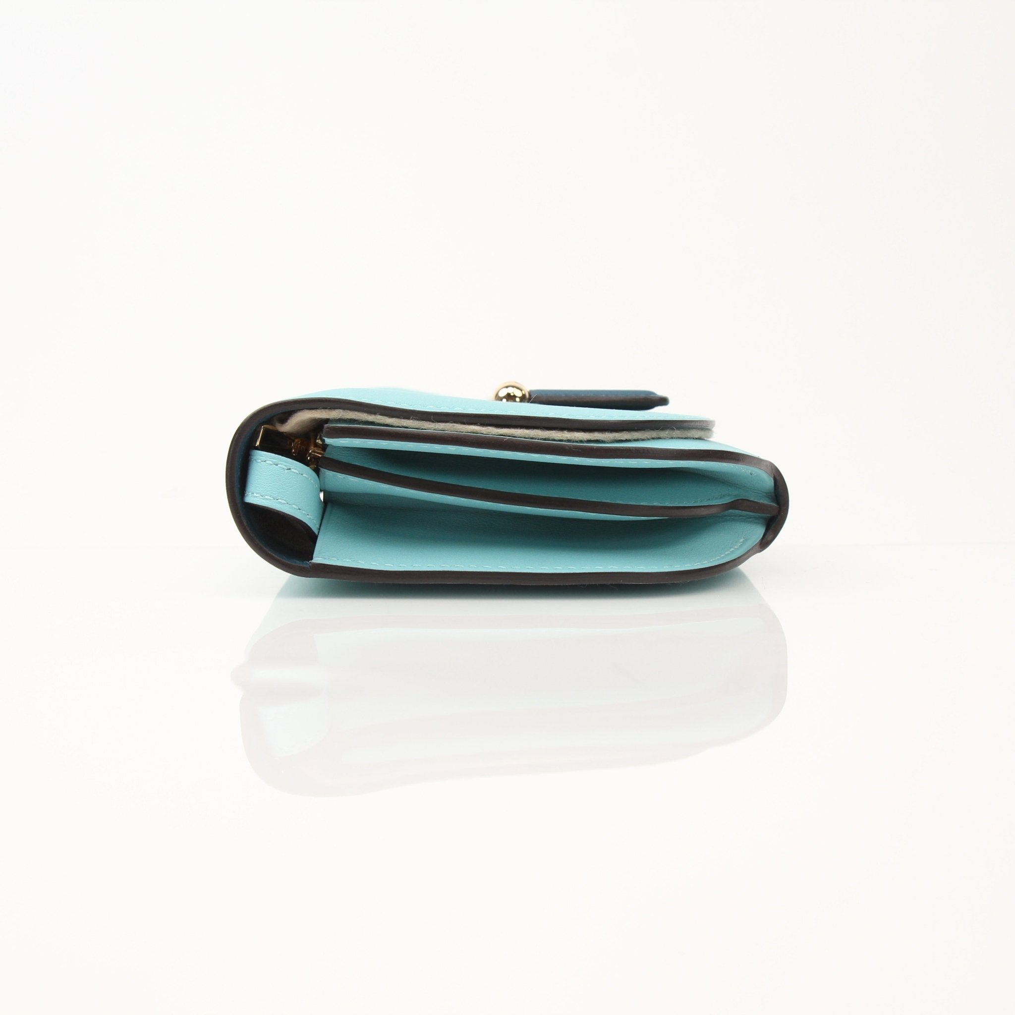 Hermès Convoyeur handbag by Gold & Beyond, showcasing the elegant leather design with gold-tone hardware and adjustable strap.