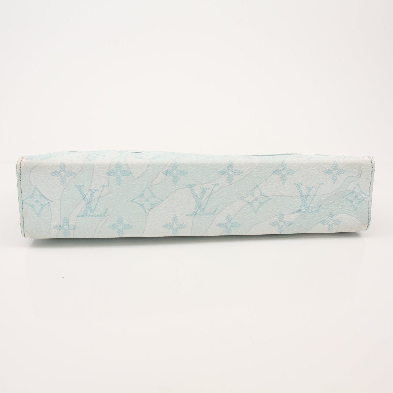Louis Vuitton Watermark Toiletry 26 travel bag with leather accents and spacious interior for toiletries and travel essentials.