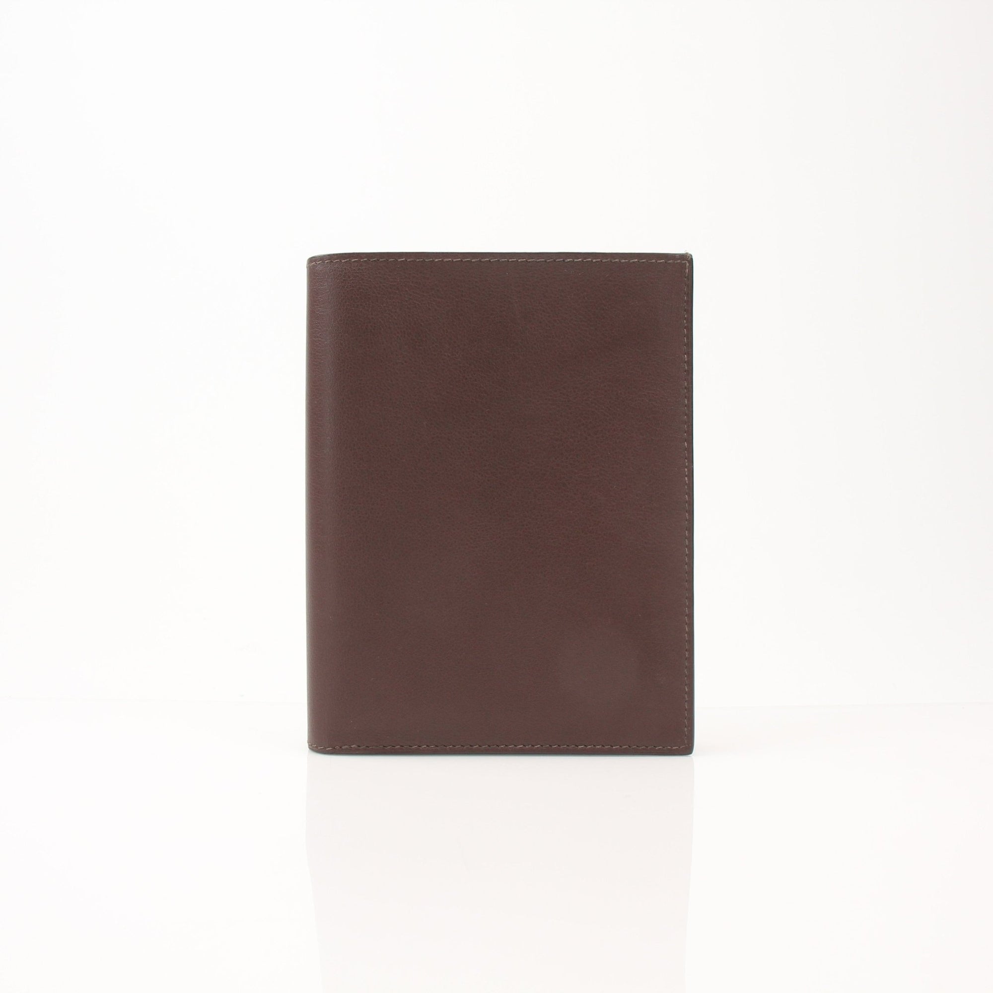 Hermès leather wallet by Gold & Beyond, showcasing a sleek, elegant design with multiple card slots and a smooth finish.
