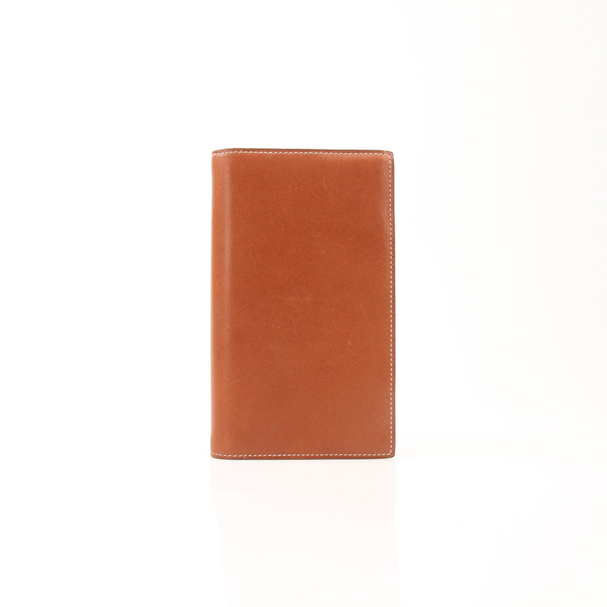 Hermès vintage notebook cover by Gold & Beyond, showcasing textured leather and elegant accessory design.