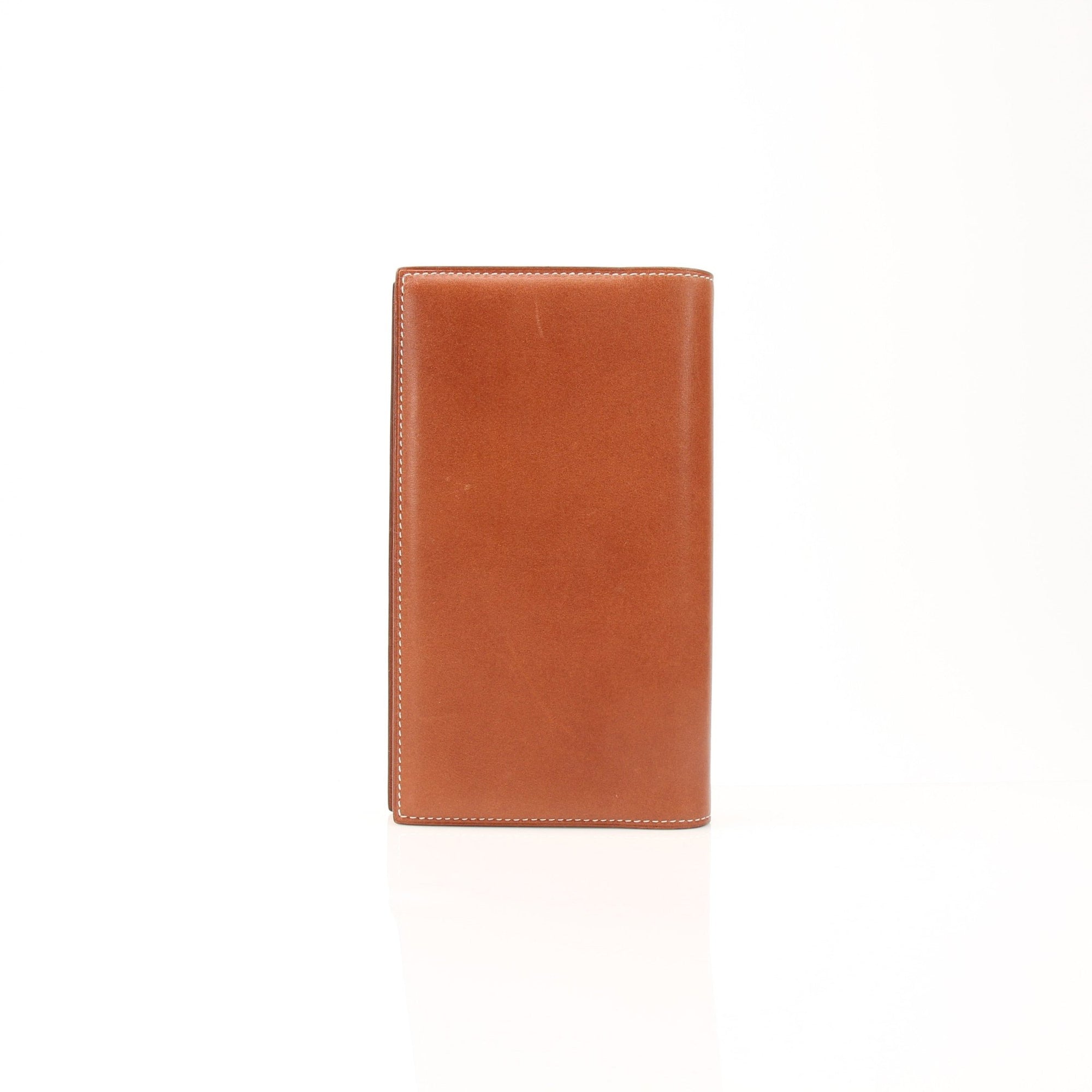 Vintage Hermès notebook cover from Gold & Beyond, featuring luxurious leather accessories with elegant craftsmanship.