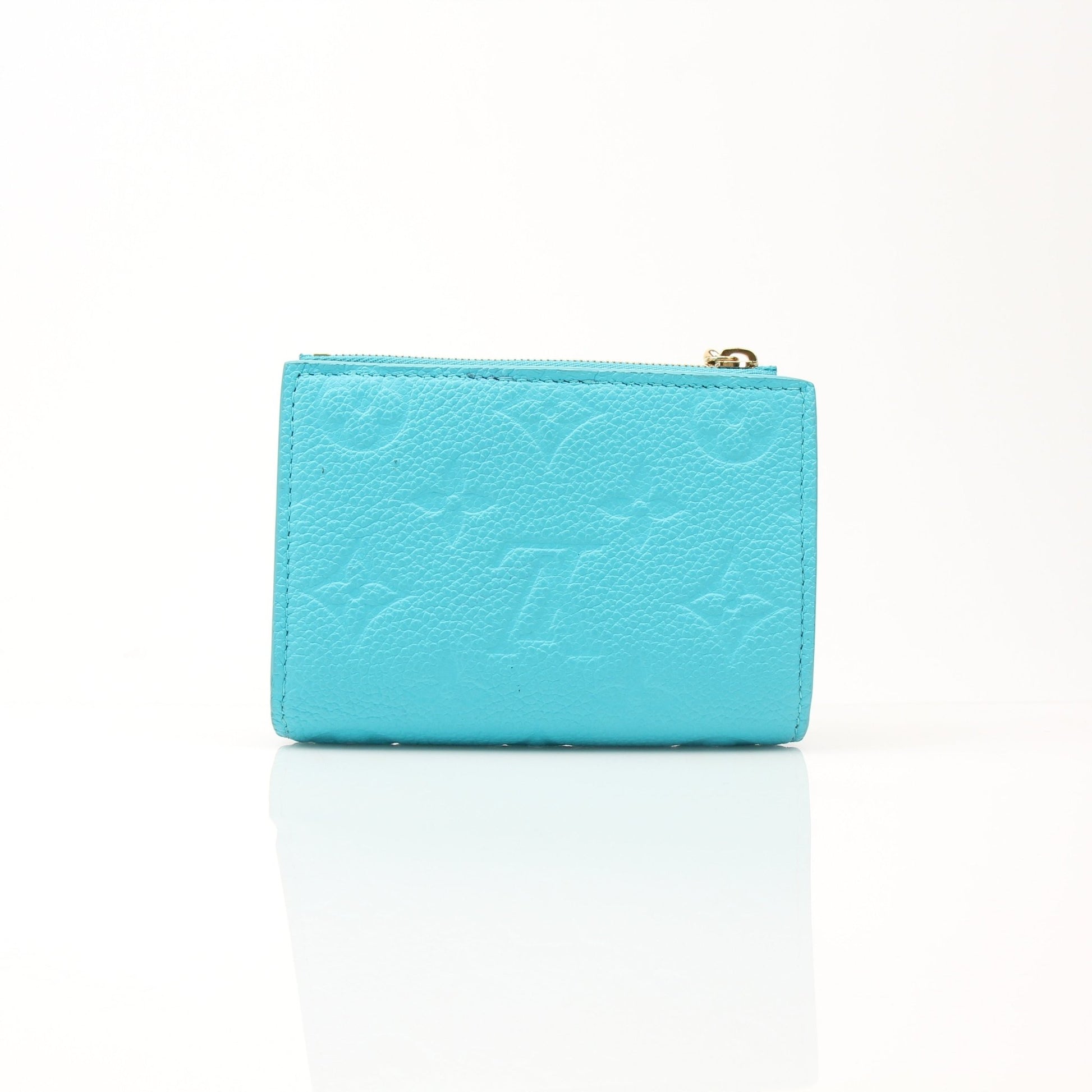 Louis Vuitton x Takashi Murakami compact wallet with colorful floral design, gold accents, and sleek leather exterior.