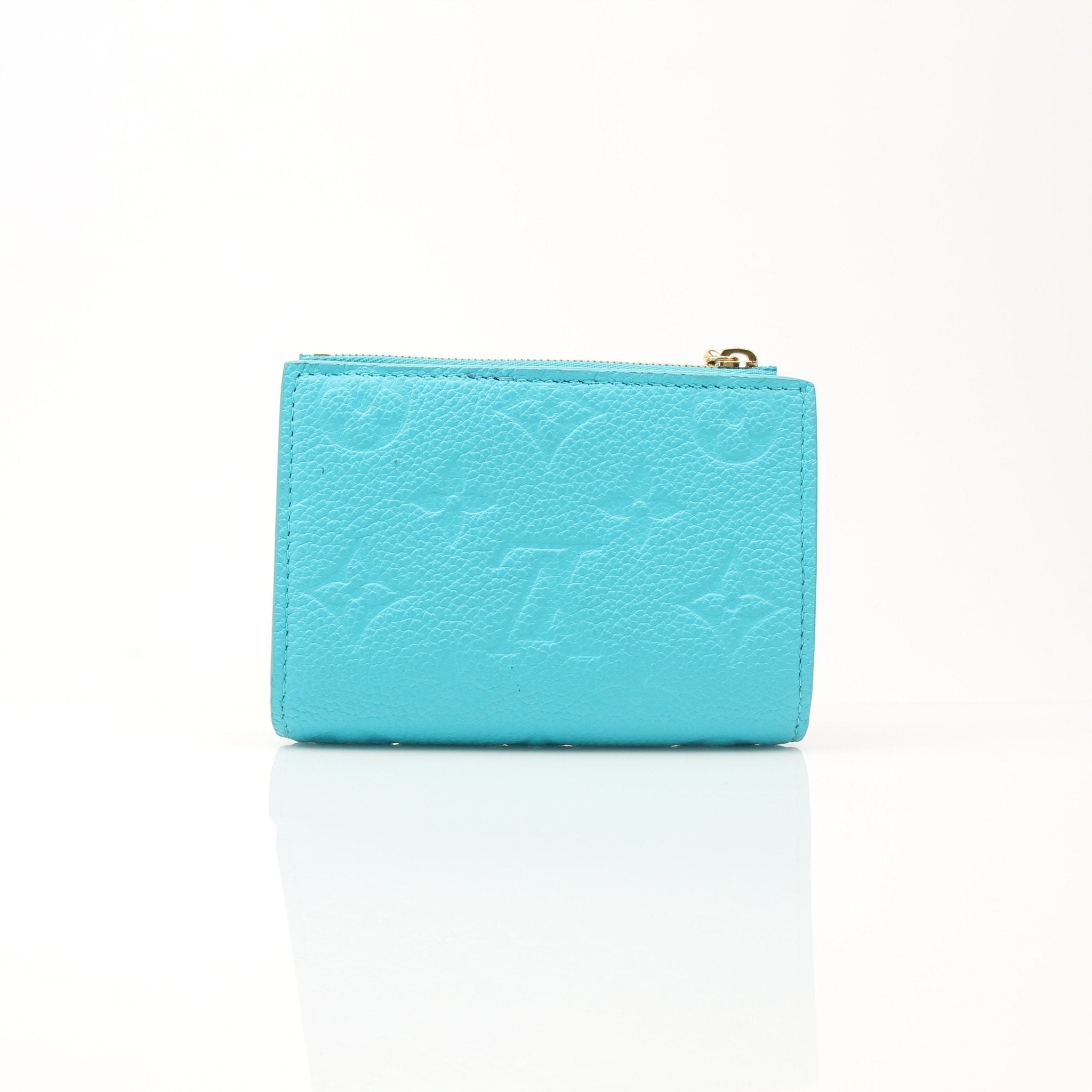 Louis Vuitton x Takashi Murakami compact wallet with colorful floral design, gold accents, and sleek leather exterior.
