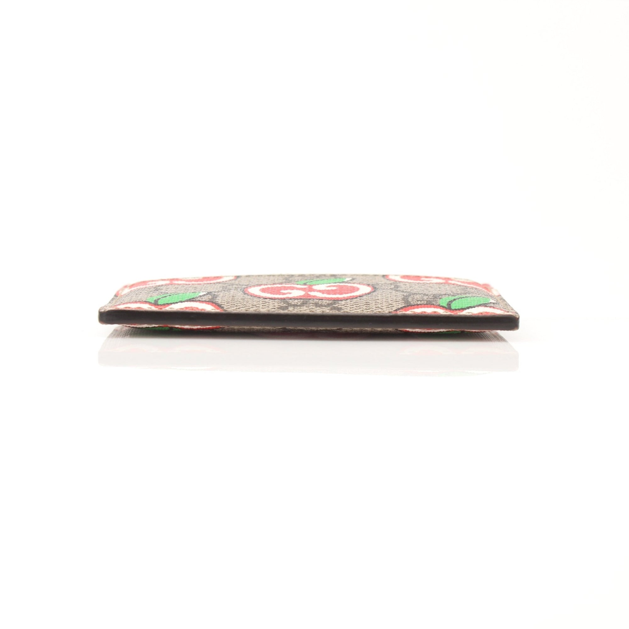 Gucci GG Supreme Apple Cardholder with gold accents, slim leather wallet for cards, by Gold & Beyond.