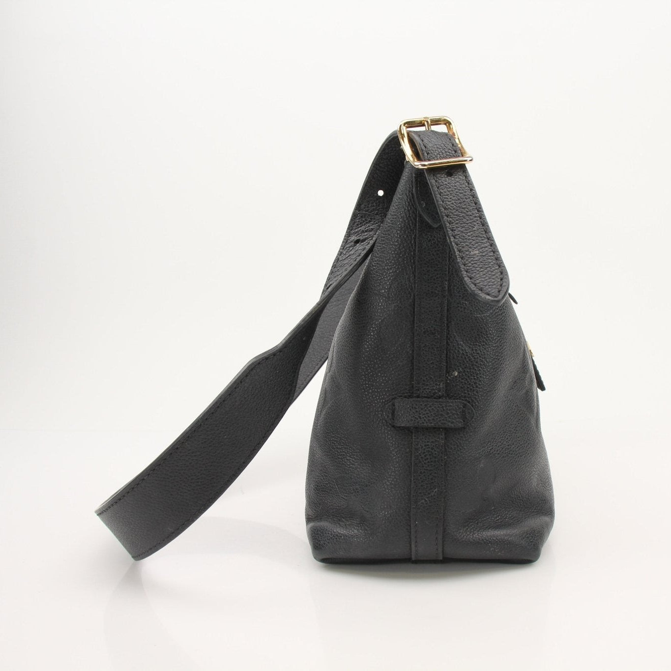 Louis Vuitton Carryall PM handbag by Gold & Beyond, showcasing the elegant design and textured leather exterior.
