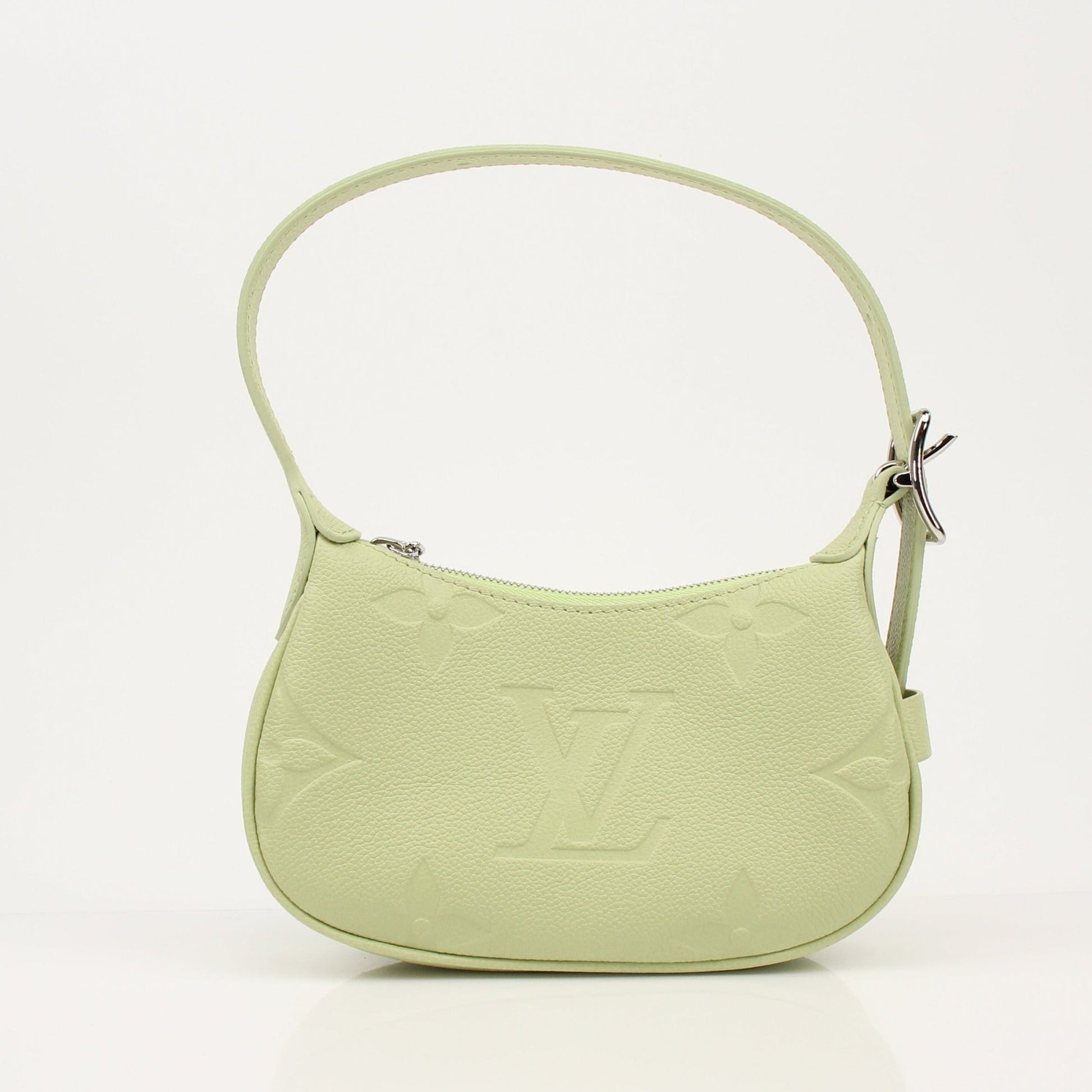 Gold & Beyond Louis Vuitton Mini Moon Bag handbag with gold-tone hardware and compact design, visible in the image.