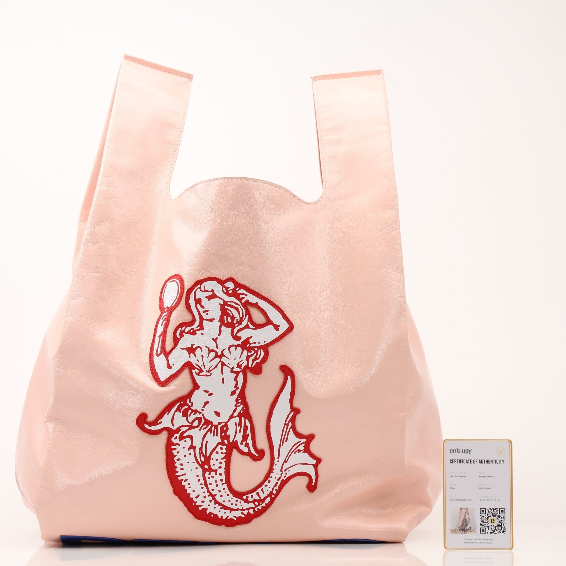 Pink Bottega Veneta Super Mercato Mermaid tote handbag with woven design, displayed on a neutral background.