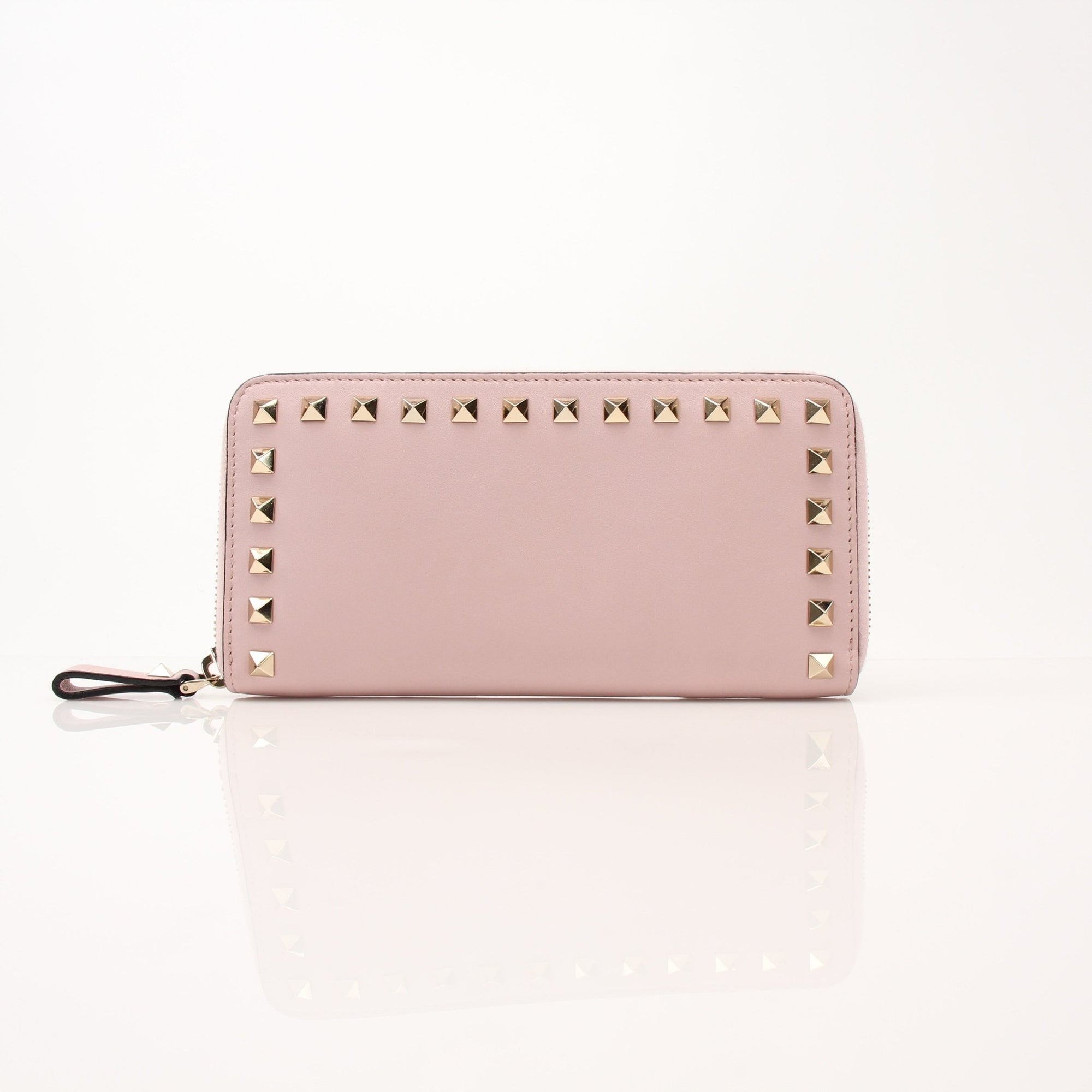 Gold & Beyond Valentino Pink Rockstud zip around wallet with gold-tone hardware and signature stud detailing.