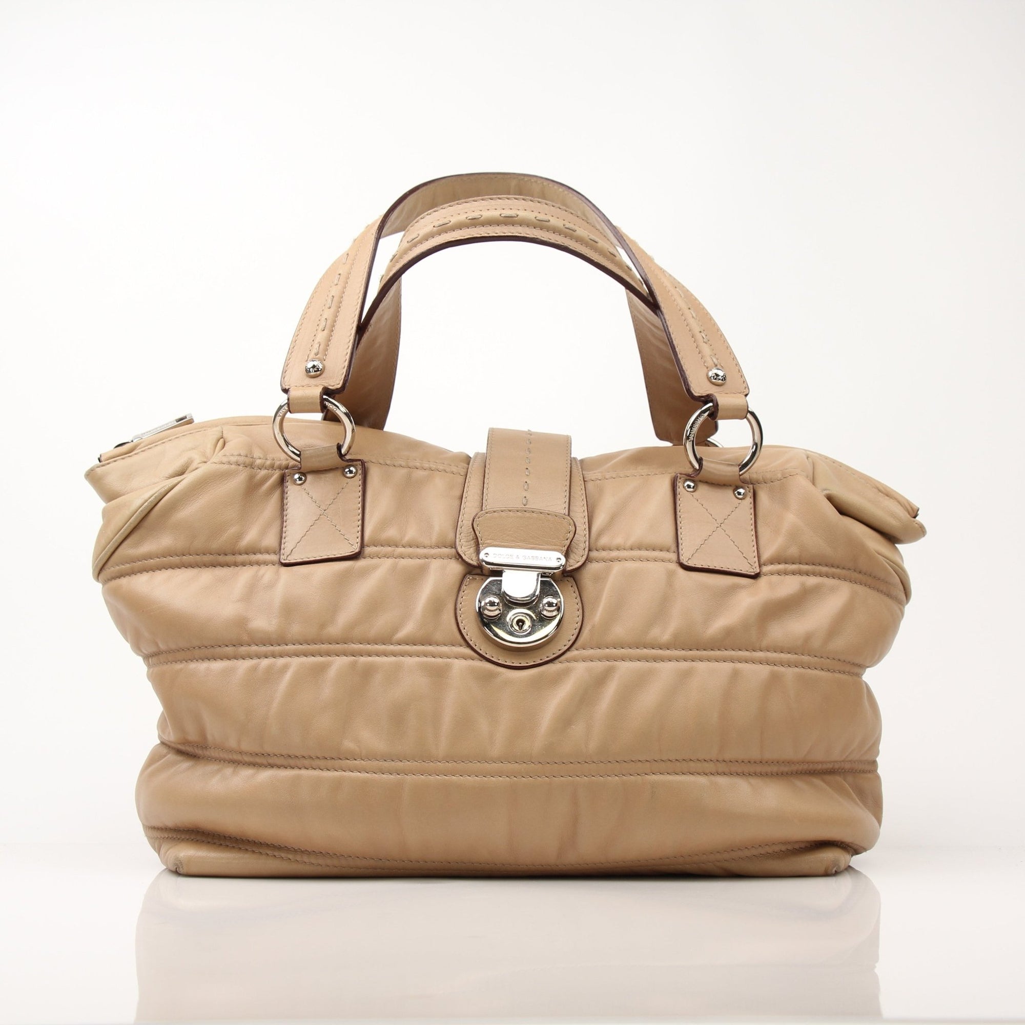 Gold & Beyond beige Dolce & Gabbana Miss Very Sexy vintage shoulder handbag with gold accents and stylish design.